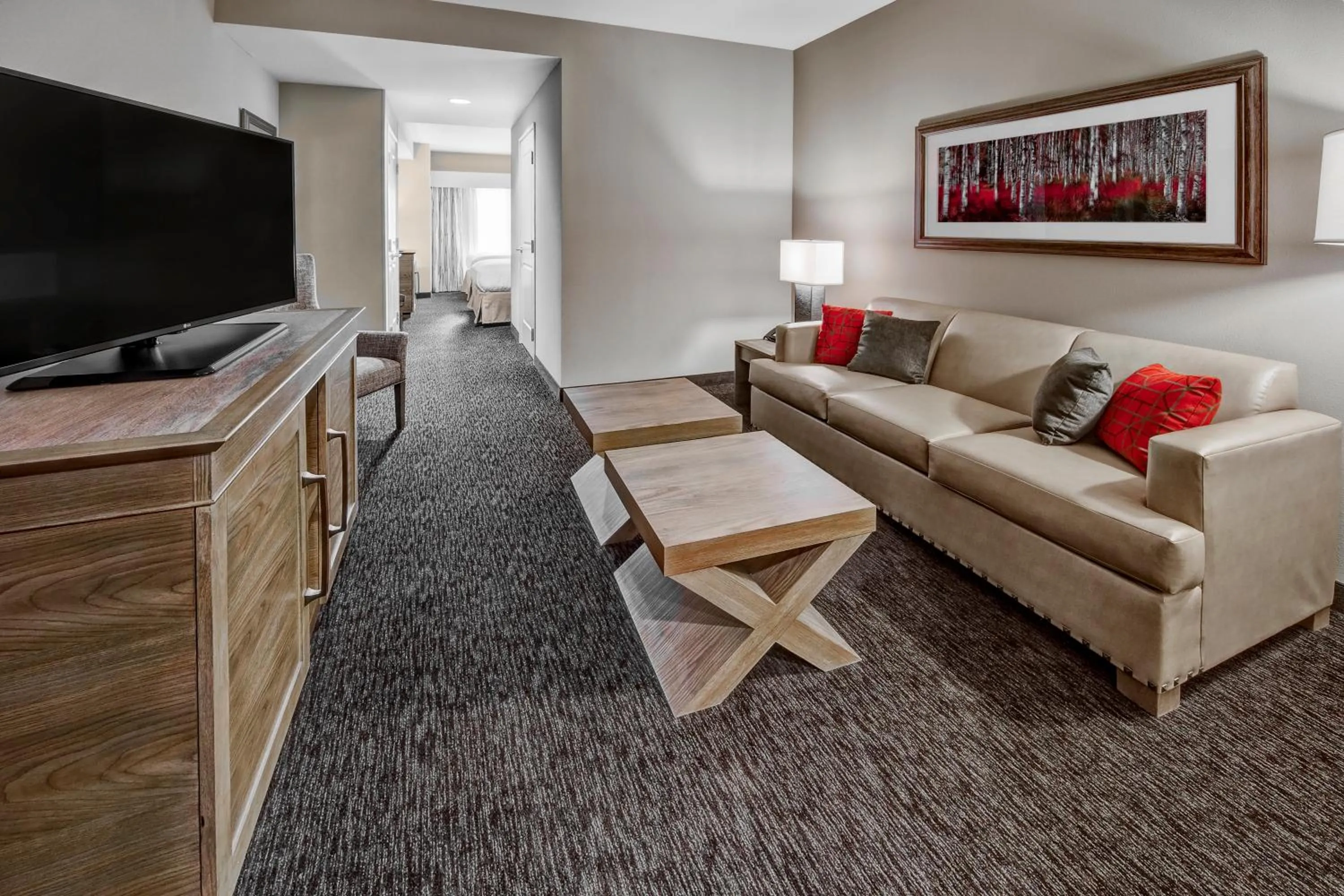 Living room in Black Fox Lodge Pigeon Forge, Tapestry Collection by Hilton