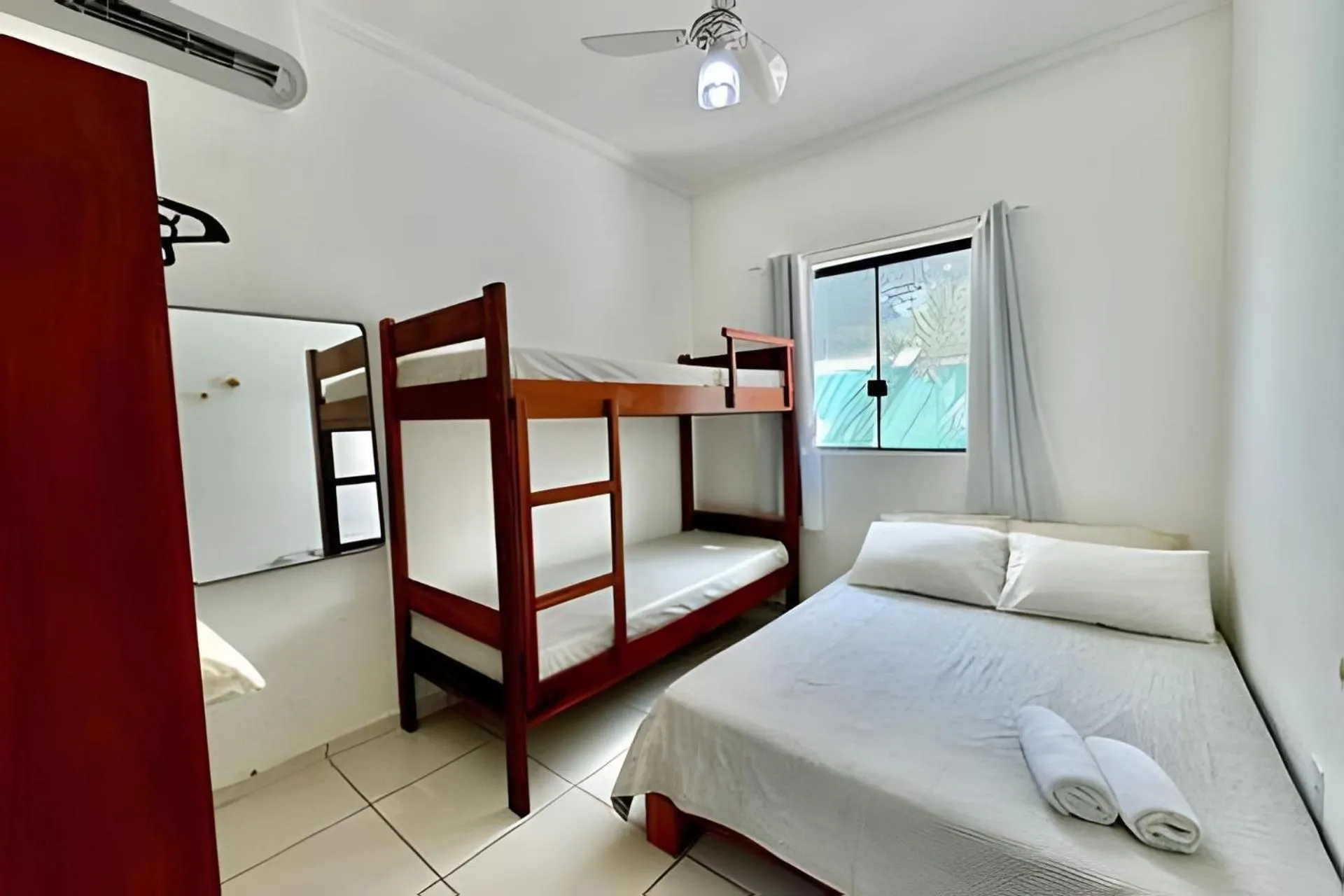 Bed in Apartamentos Recanto da Barra