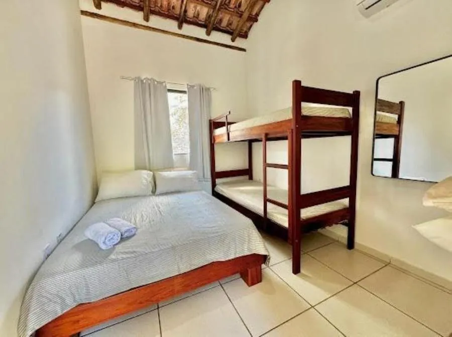 Bed in Apartamentos Recanto da Barra