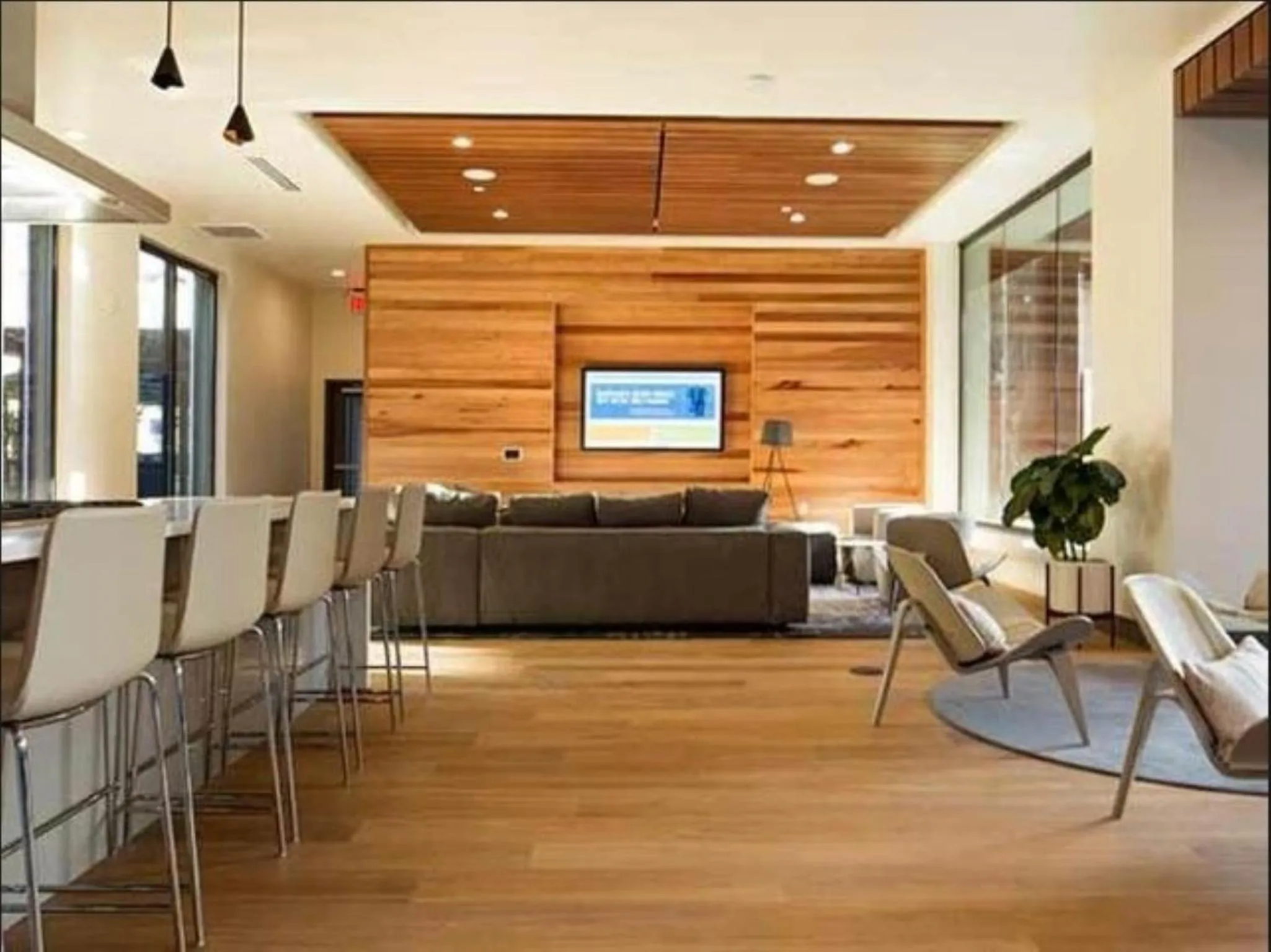 Communal lounge/ TV room in Global Luxury Suites at Downtown Mountain View