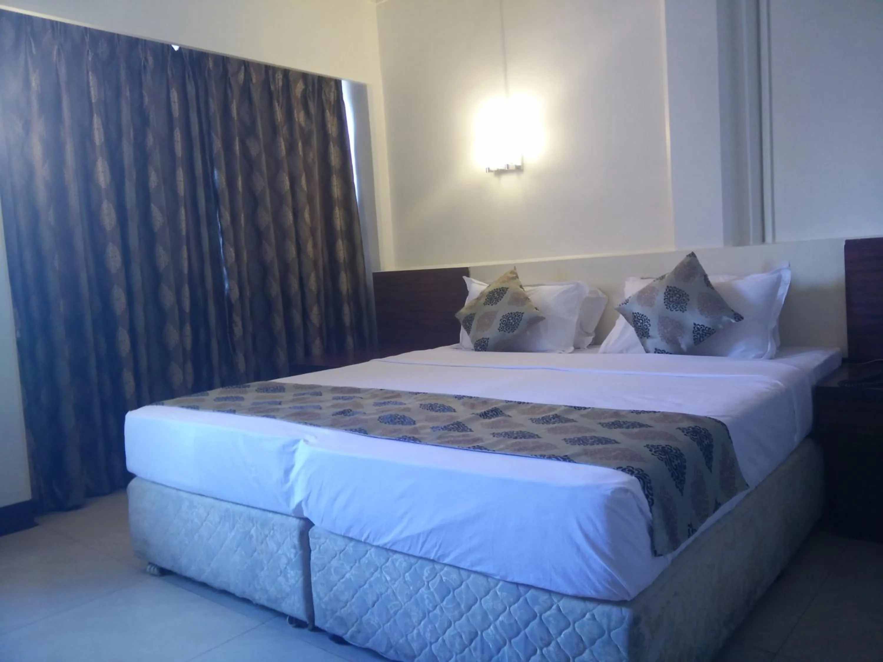 Photo of the whole room, Bed in Strand Hotel, Colaba - A Seafront property