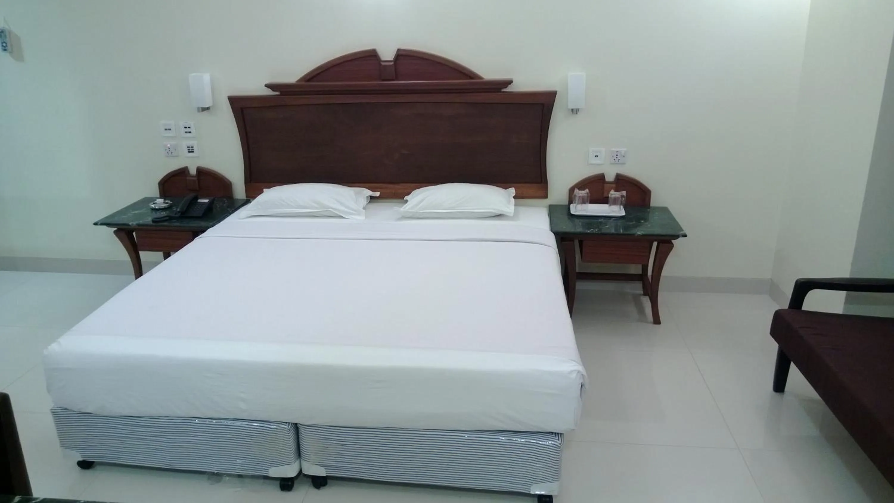 Photo of the whole room, Bed in Strand Hotel, Colaba - A Seafront property