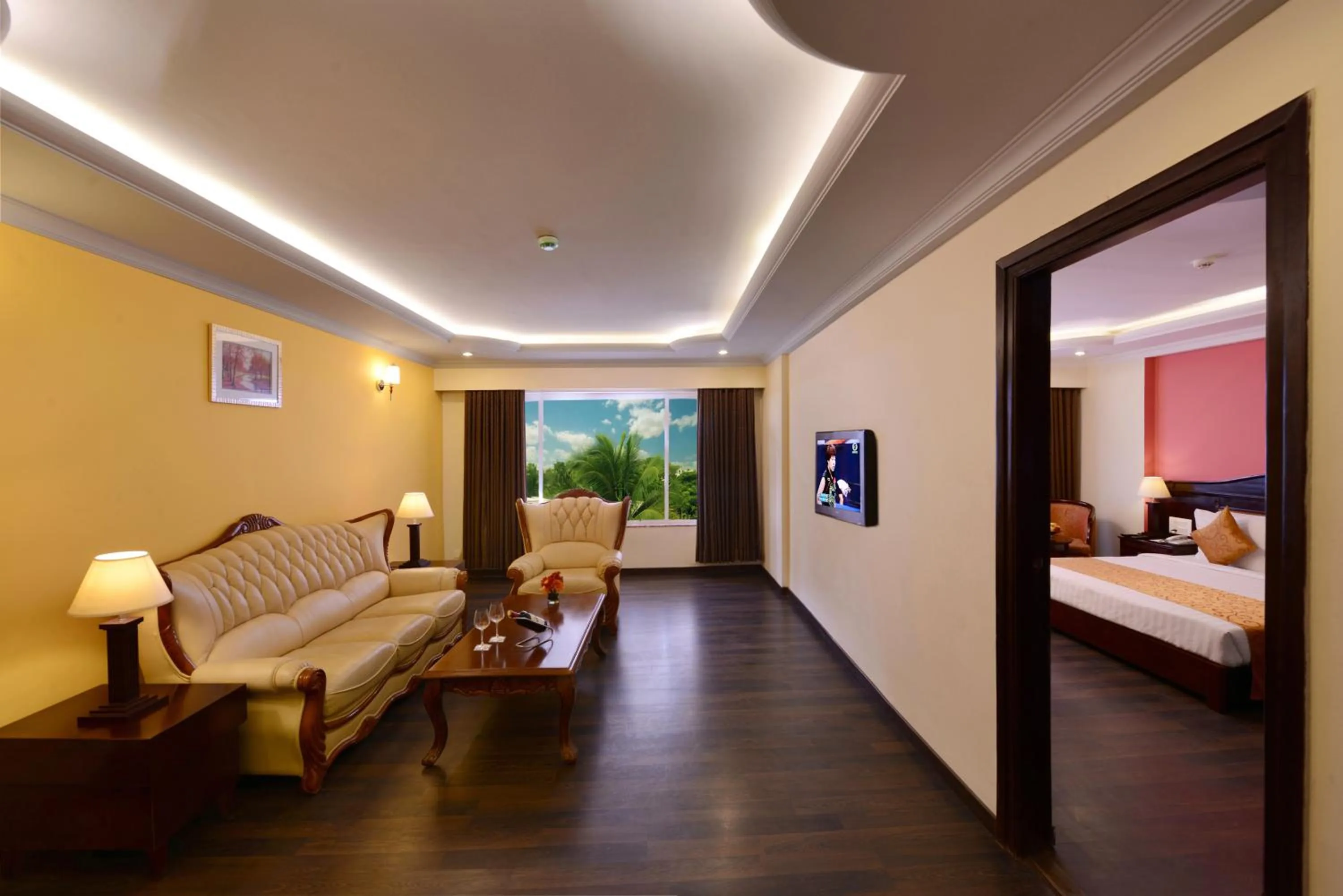 Living room, Bed in Keshav Clarks Inn Gadag