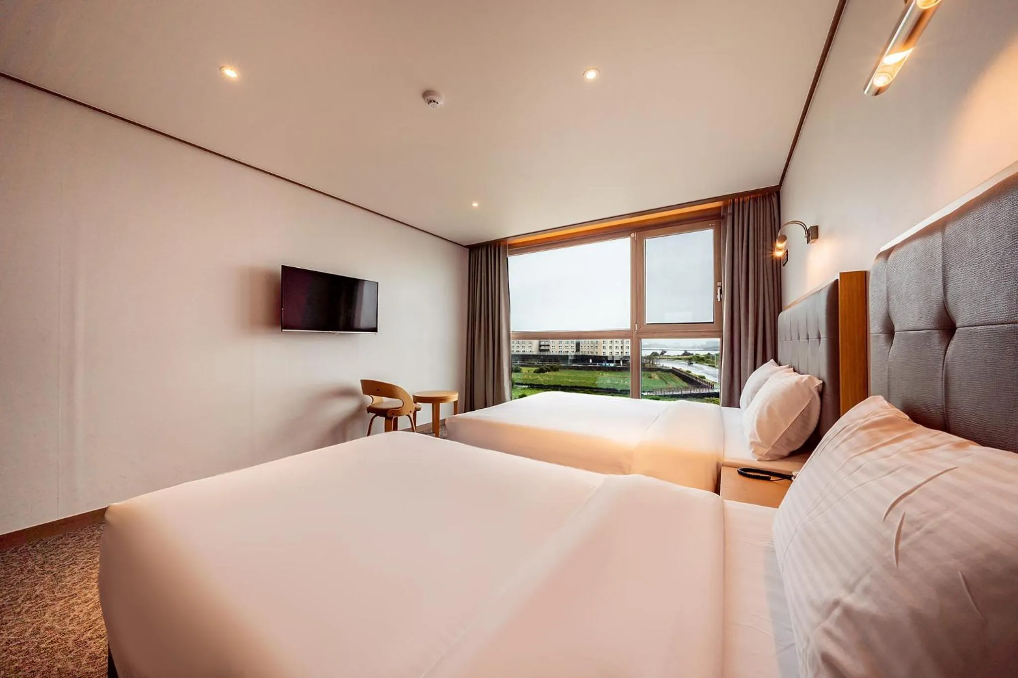 Photo of the whole room, Bed in Sunrise Hotel Seongsan