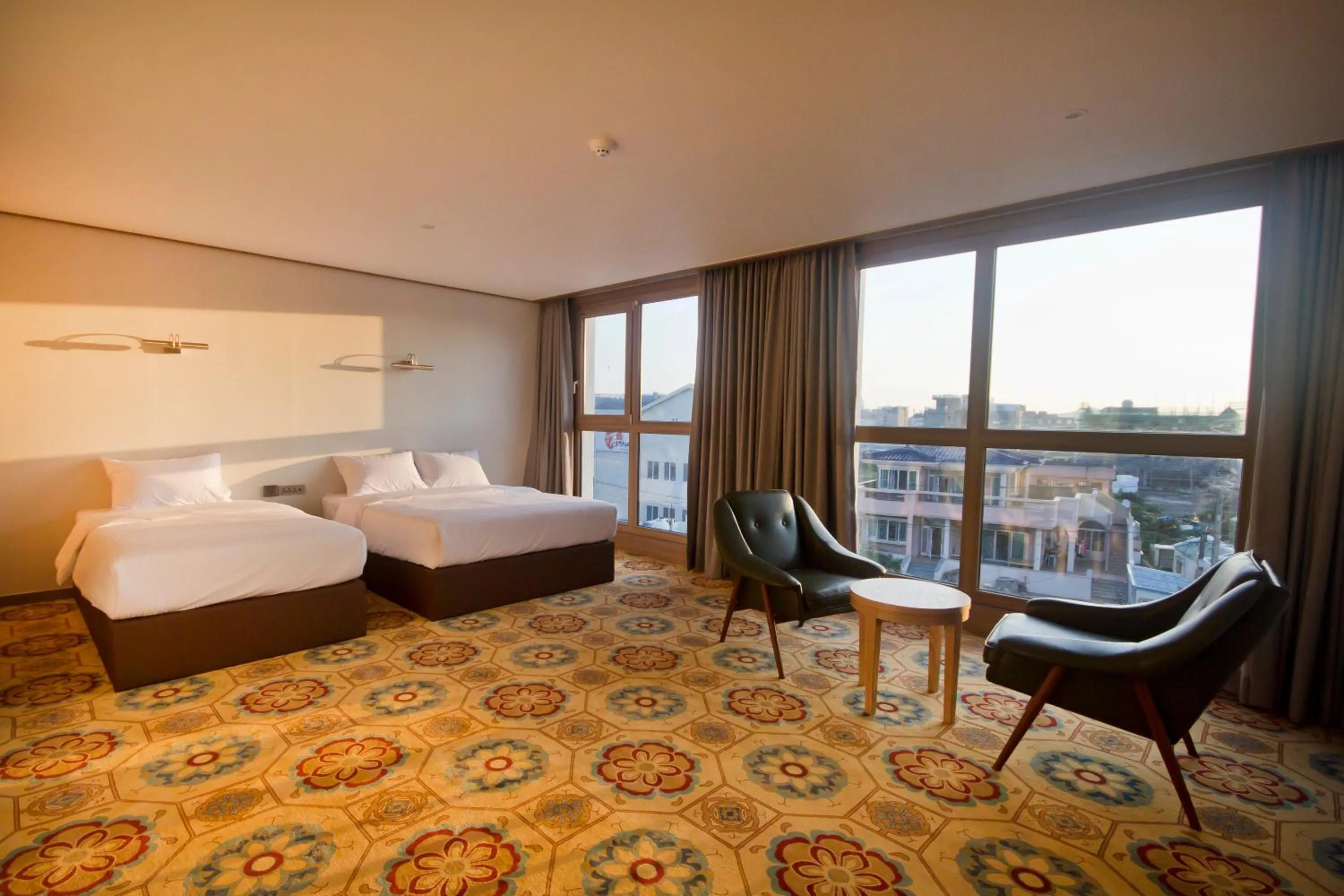 Photo of the whole room, Bed in Sunrise Hotel Seongsan