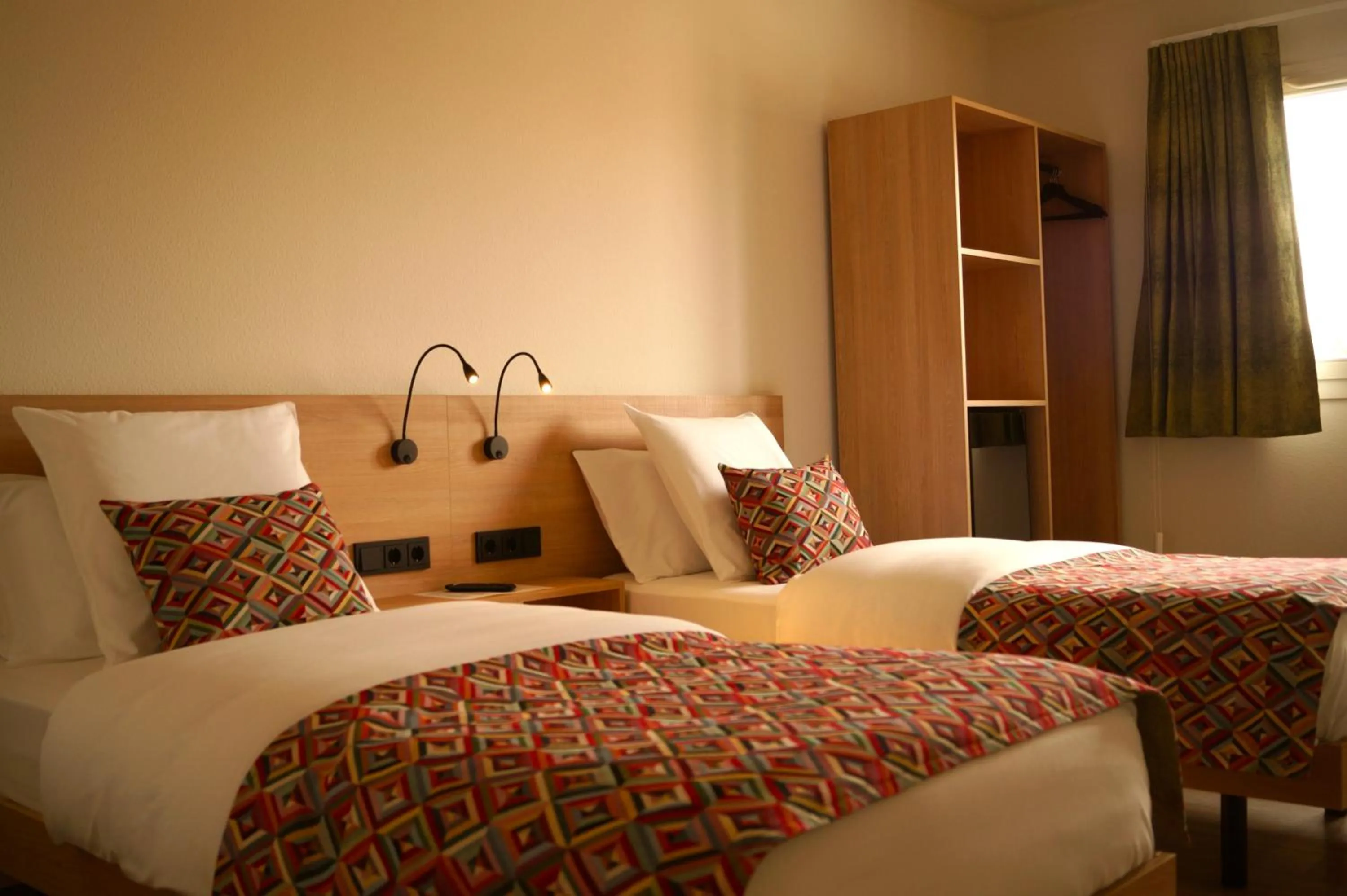 Bed in Hotel-Restaurant Stand'Inn