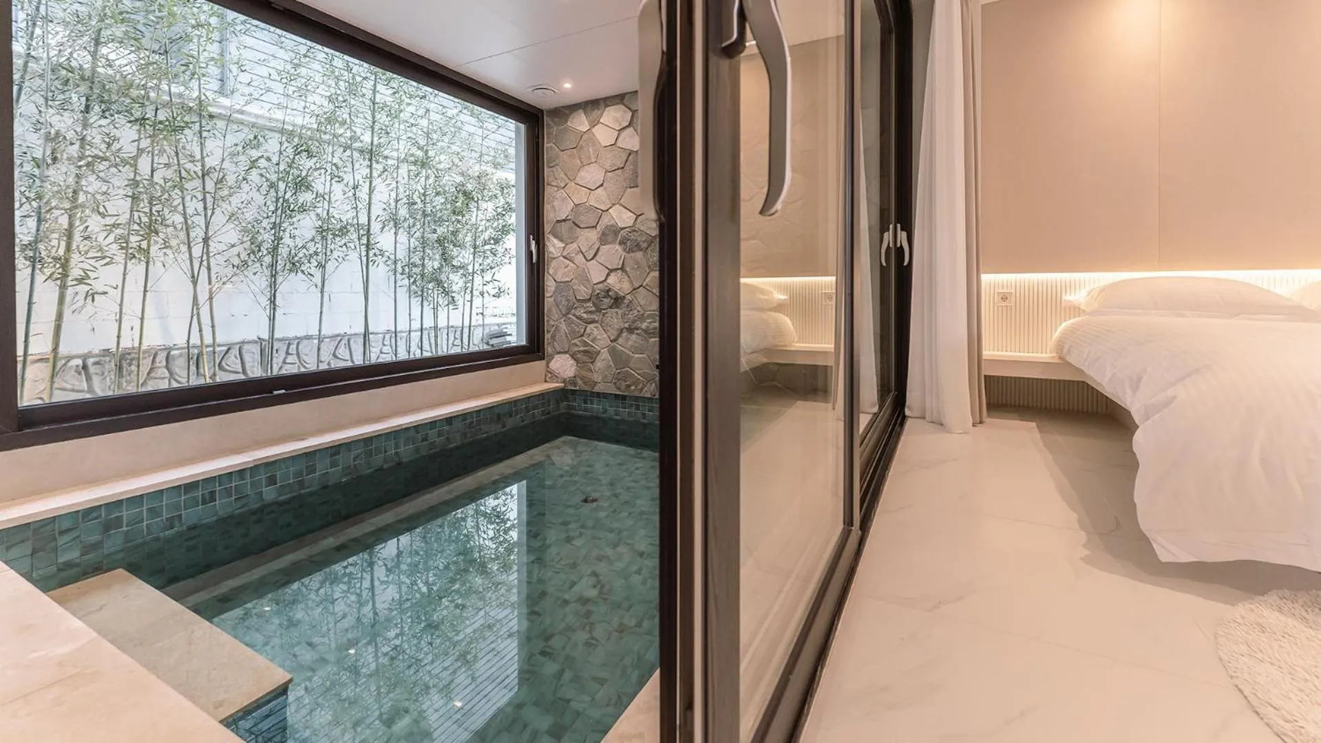 Swimming pool, Bed in Bomun World Pension