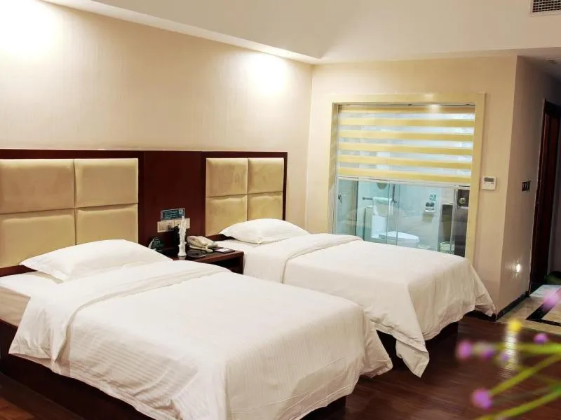 Bed in GreenTree Inn GuangDong Jieyang Konggang District Wangjiang North Road Business Hotel
