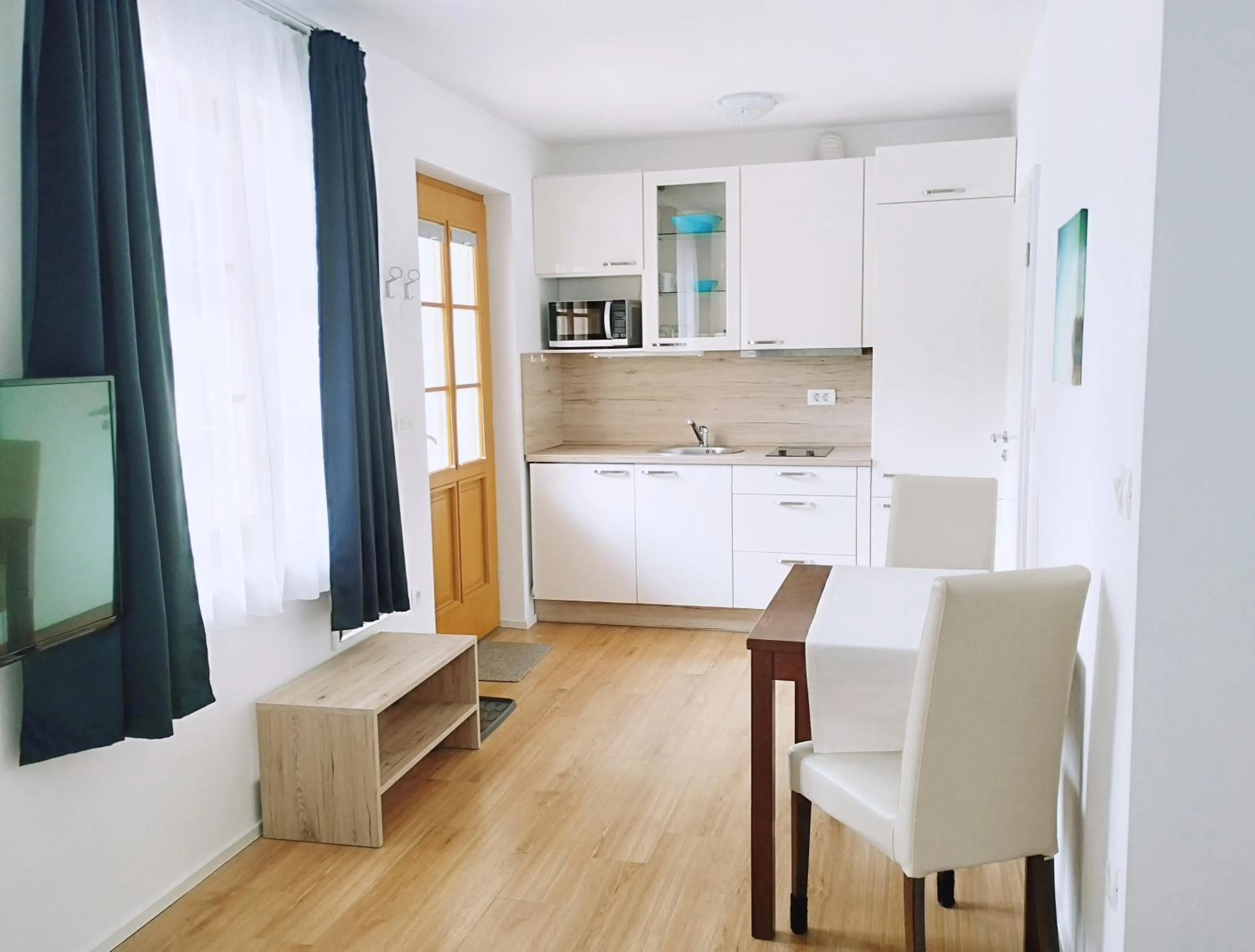 Kitchen or kitchenette in Apartments Wallas