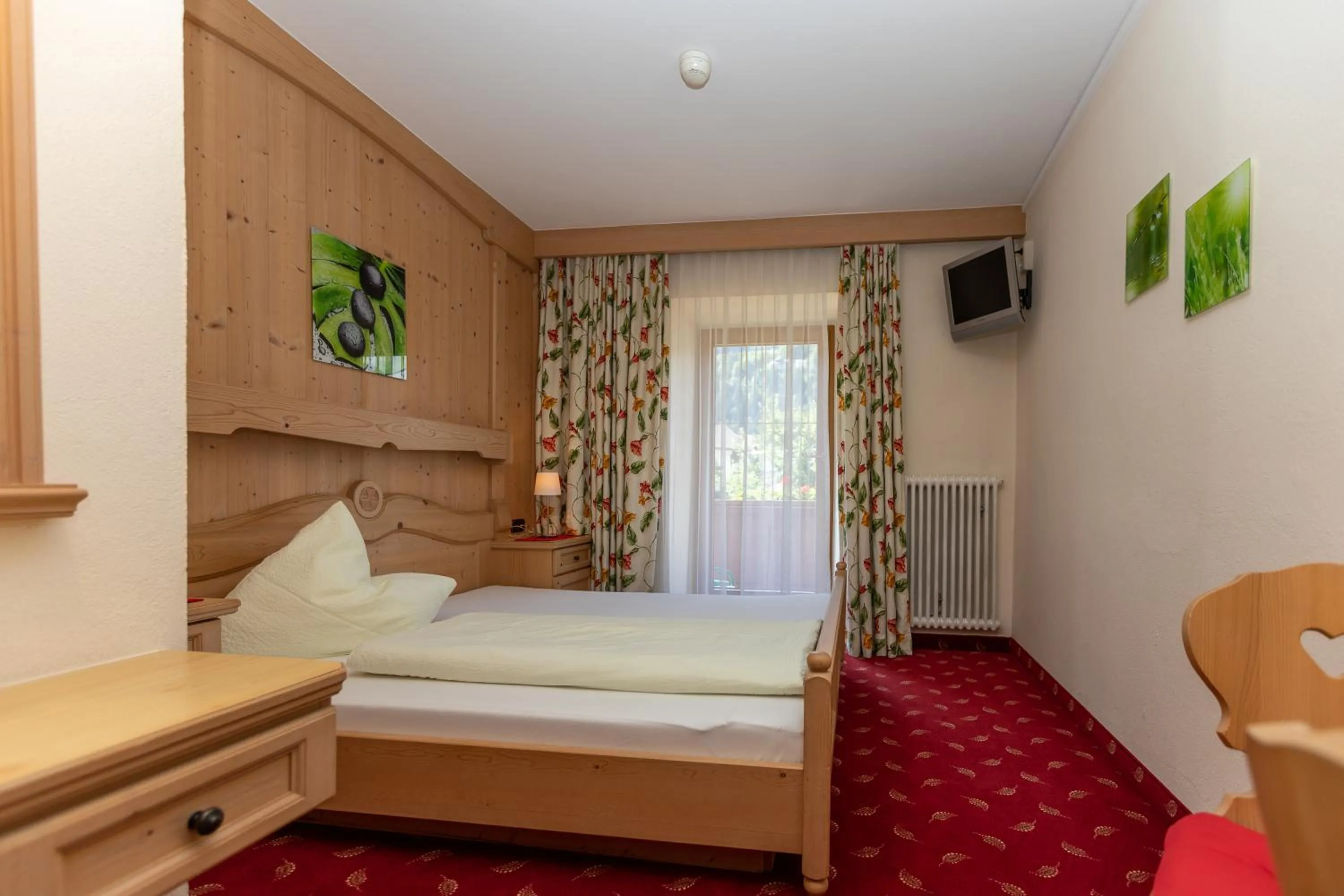 Bed in Hotel Garni Elisabeth