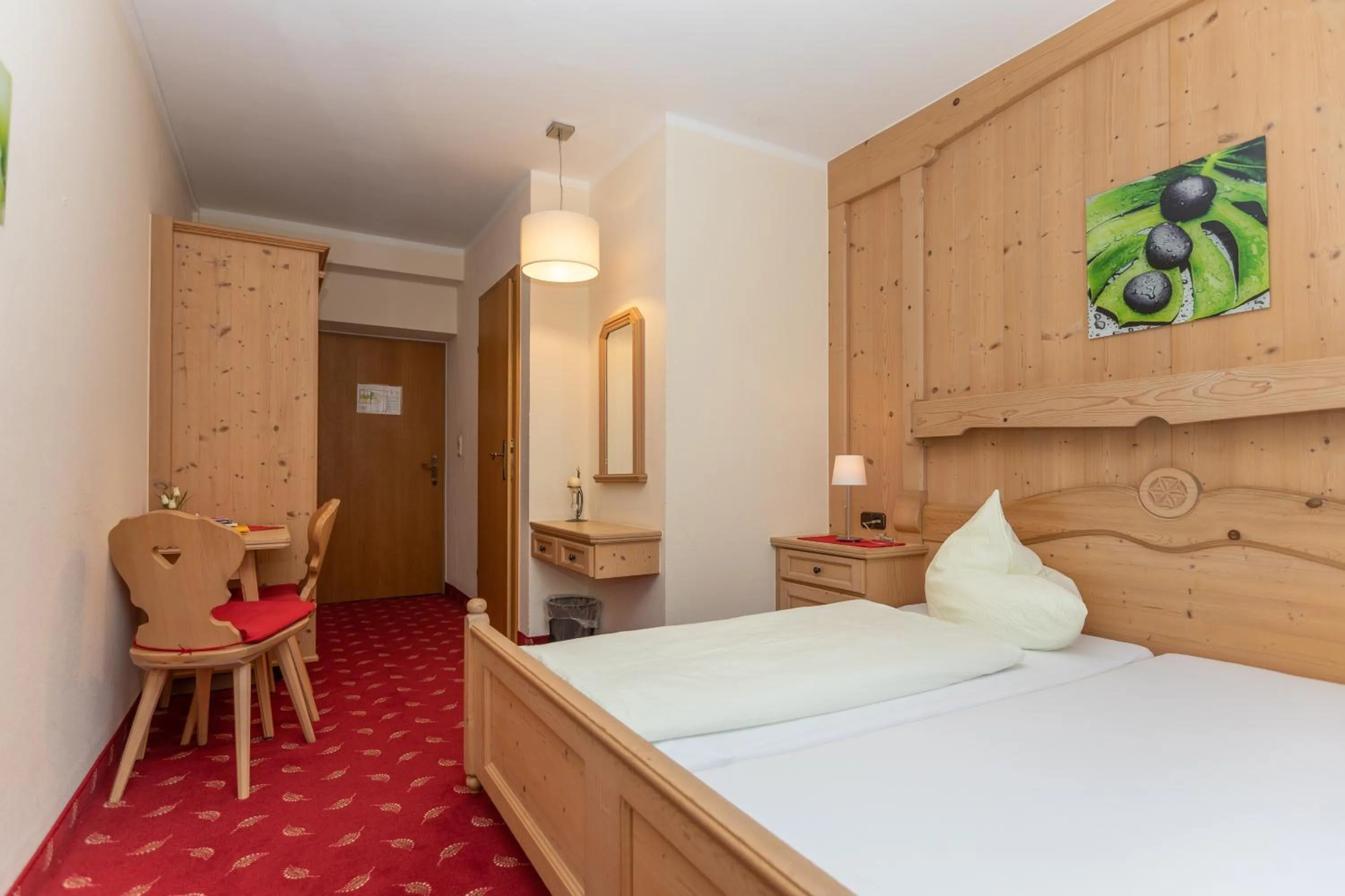 Bed in Hotel Garni Elisabeth