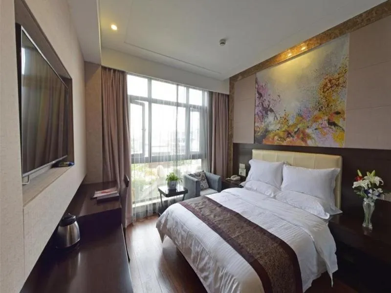 Bed in GreenTree Inn JiangSu Changzhou Dinosaur Park Global Harbor Express Hotel