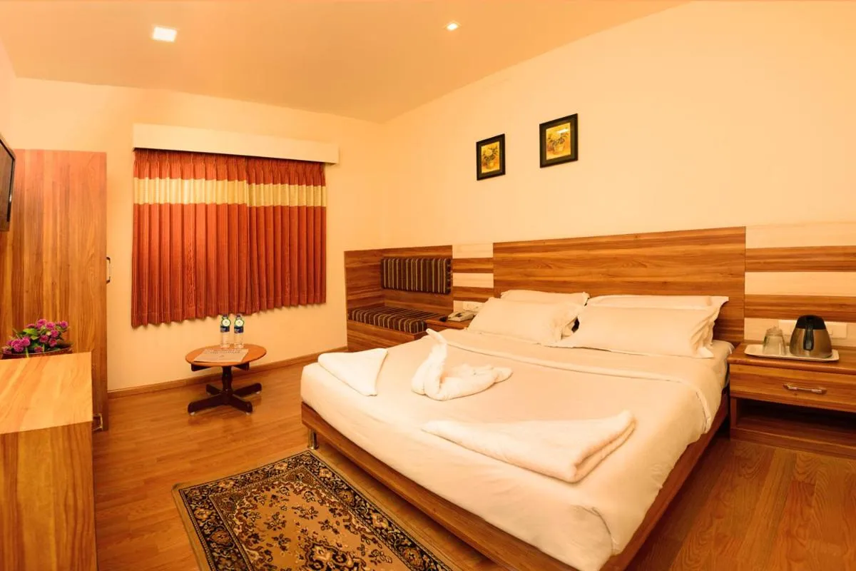 Bed in Hotel Grand Palace