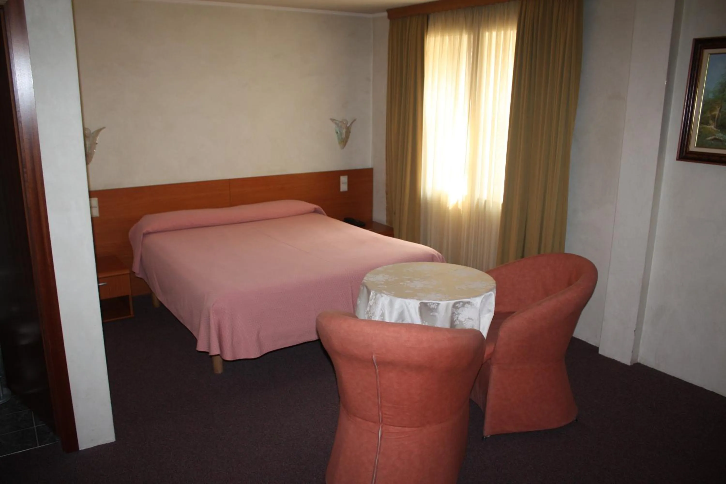 Photo of the whole room, Bed in Auberge Gaglioti