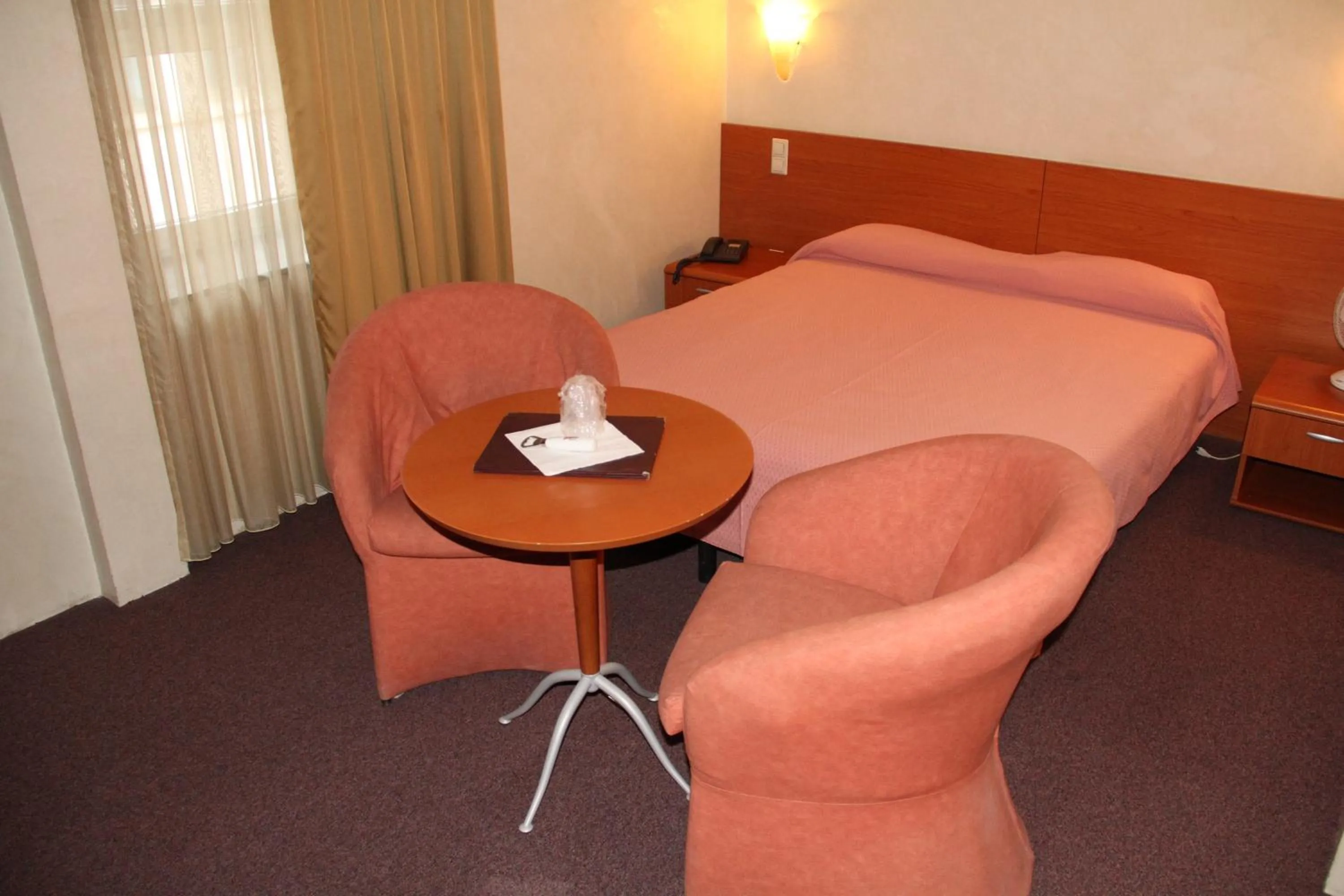 Photo of the whole room, Bed in Auberge Gaglioti