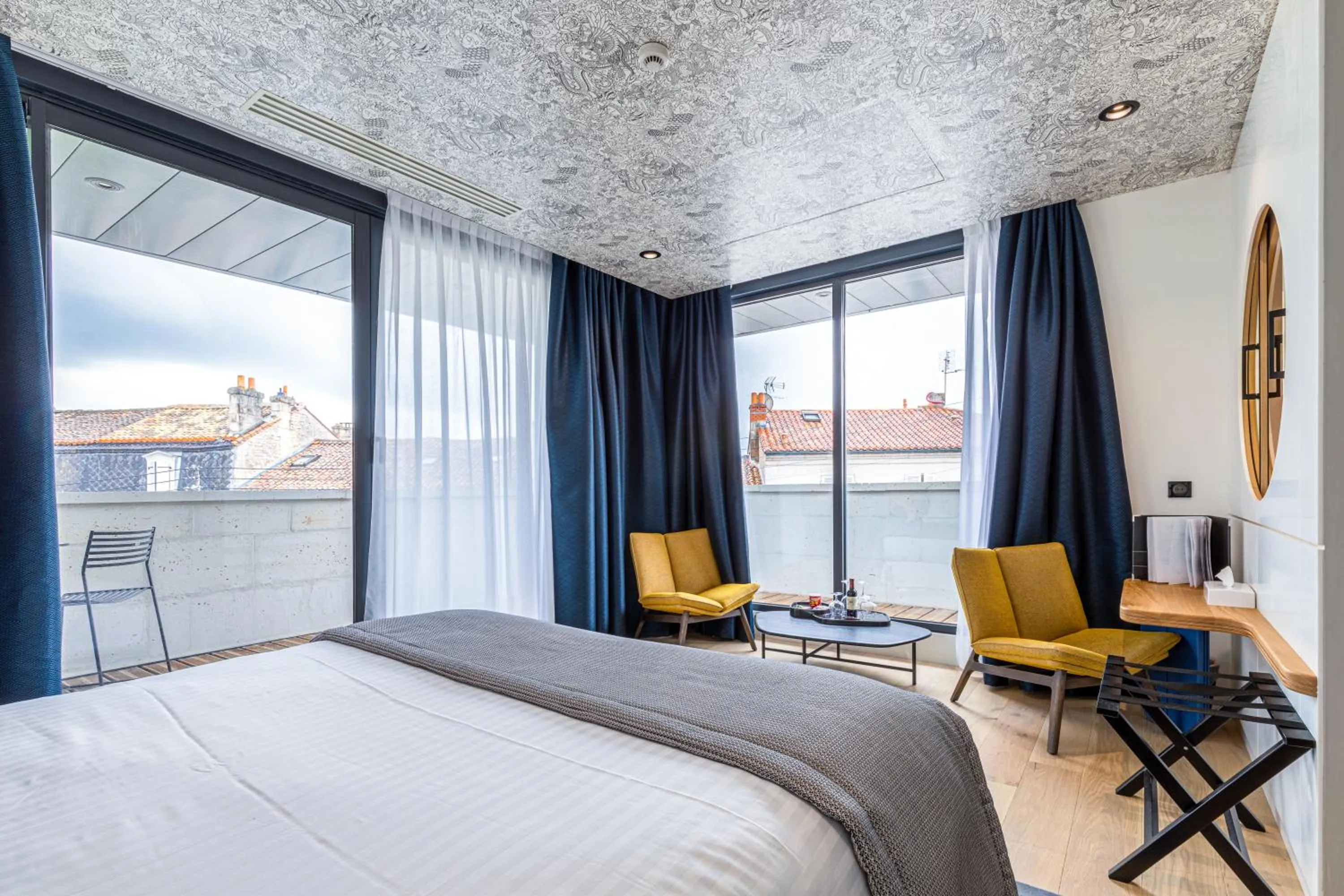 Bed in Hotel Le Saint Gelais