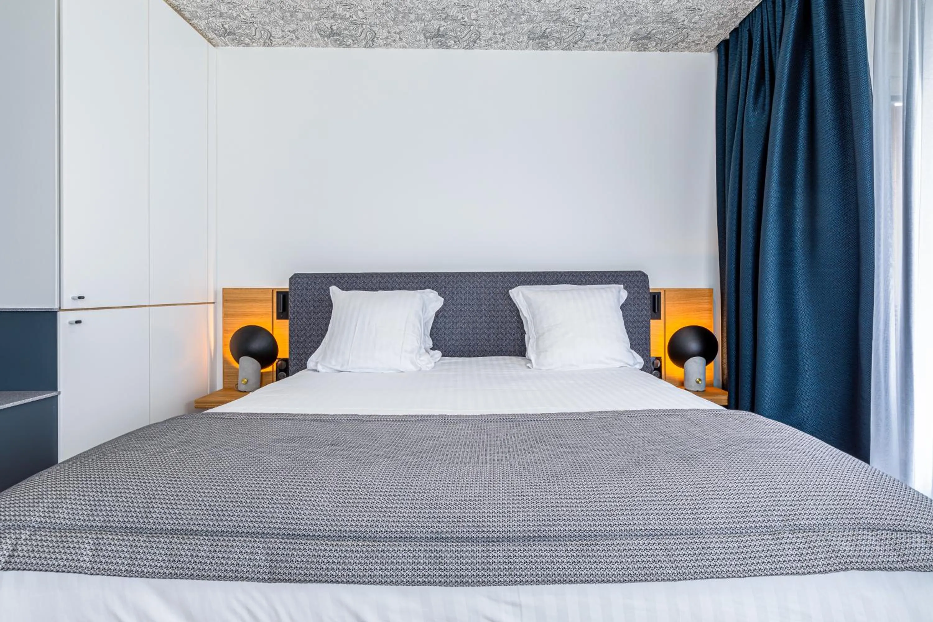 Bed in Hotel Le Saint Gelais