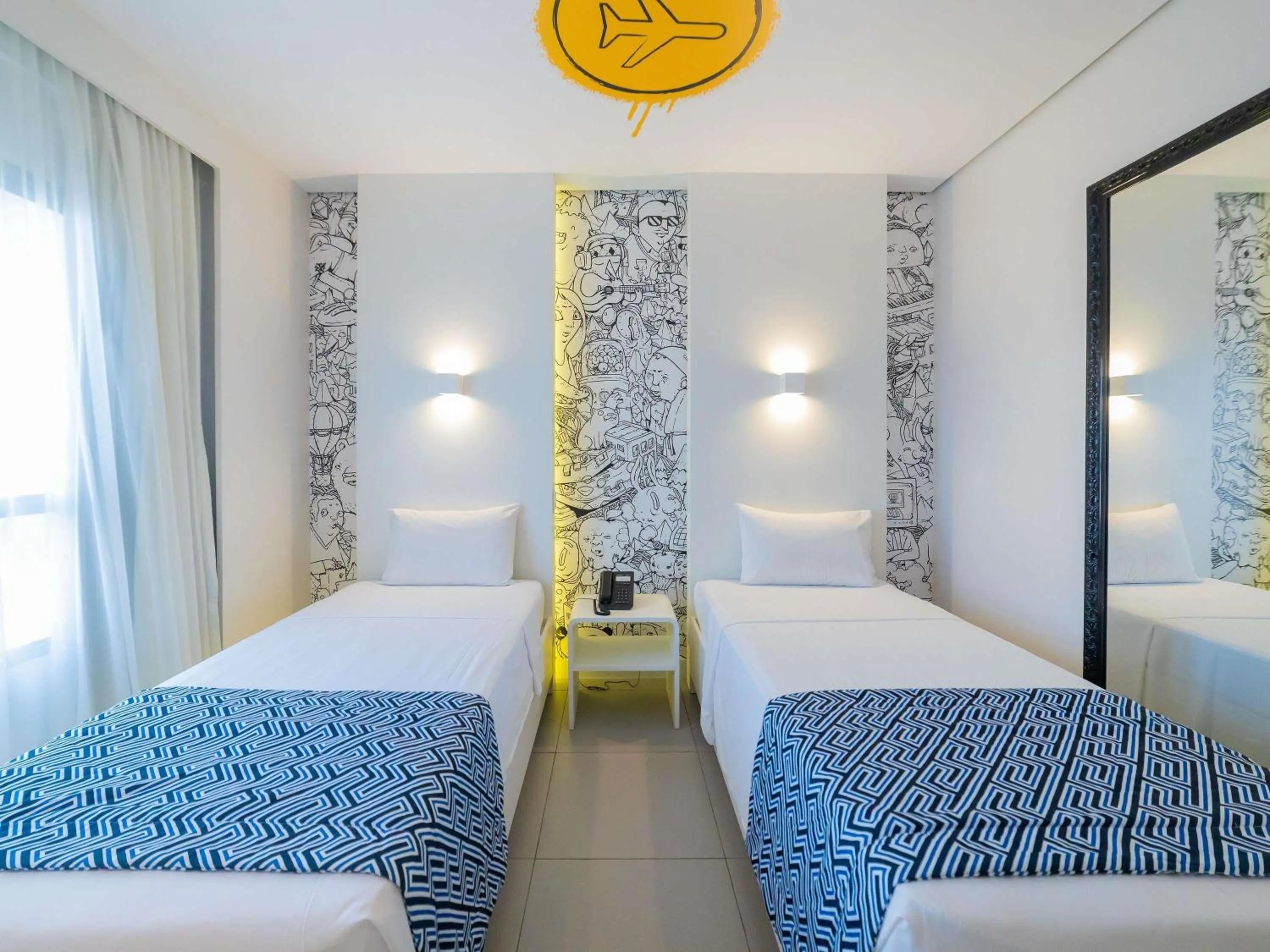 Bedroom in ibis Styles Maracanau