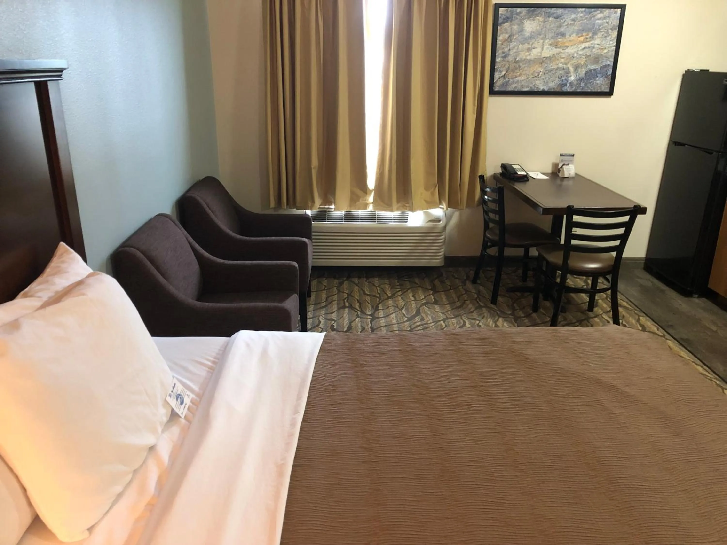 Bed in Aptel Studio Hotel