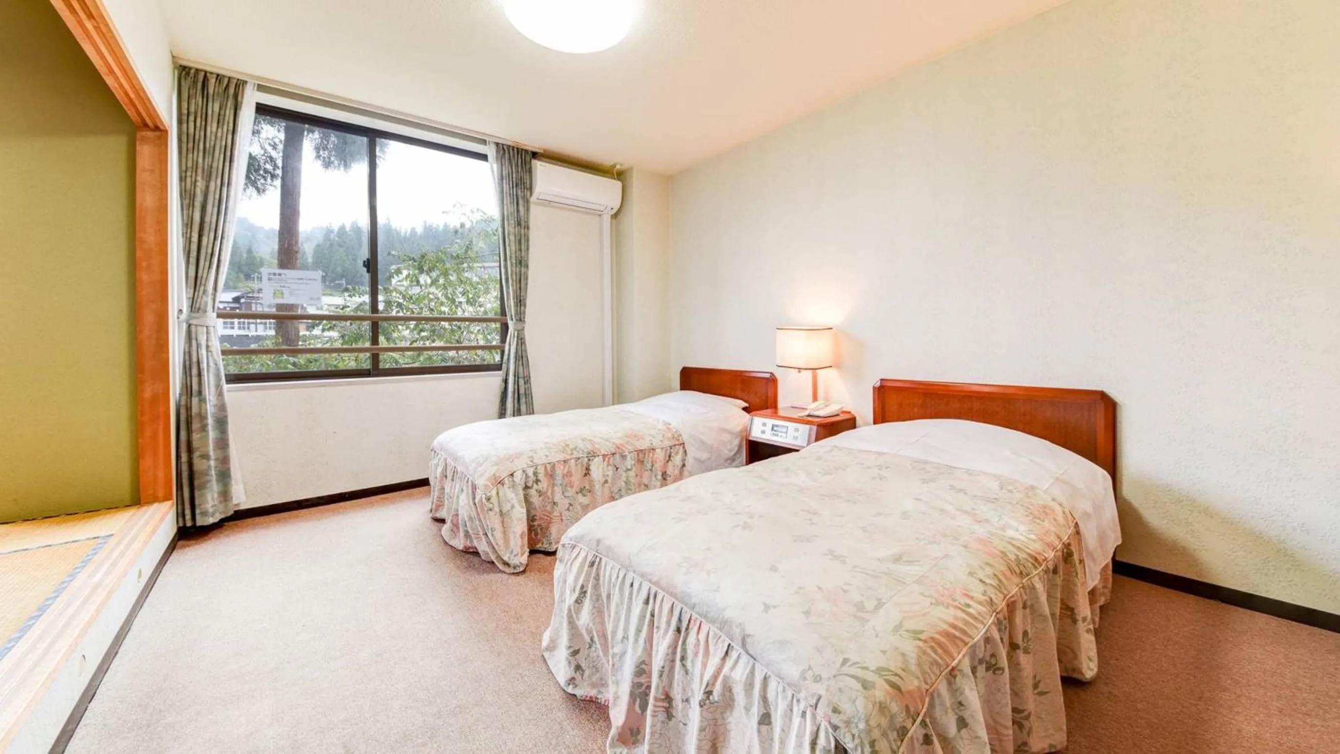 Bed in Hotel Yunotaniso