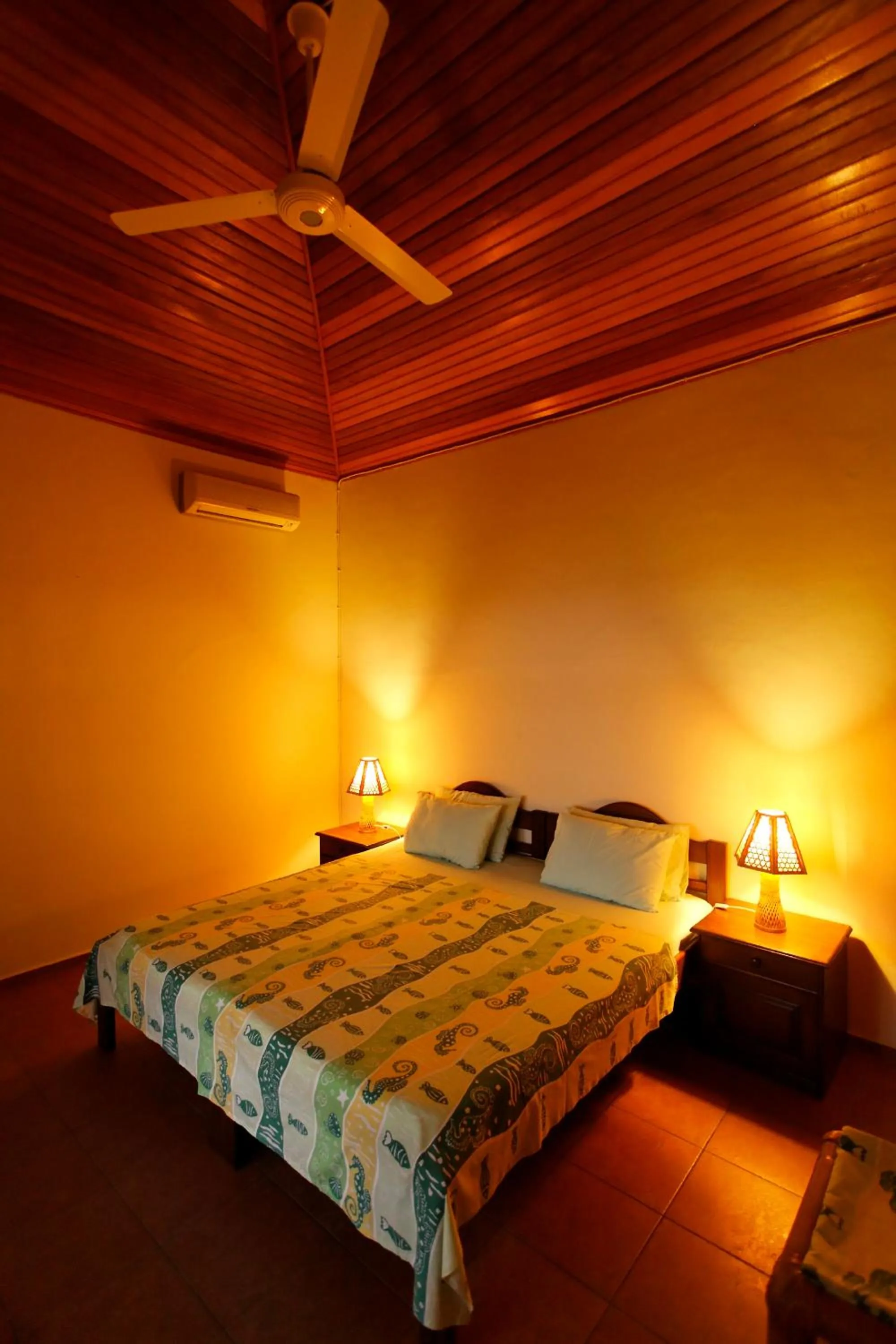 Bed in Lumbalumba Resort - Manado
