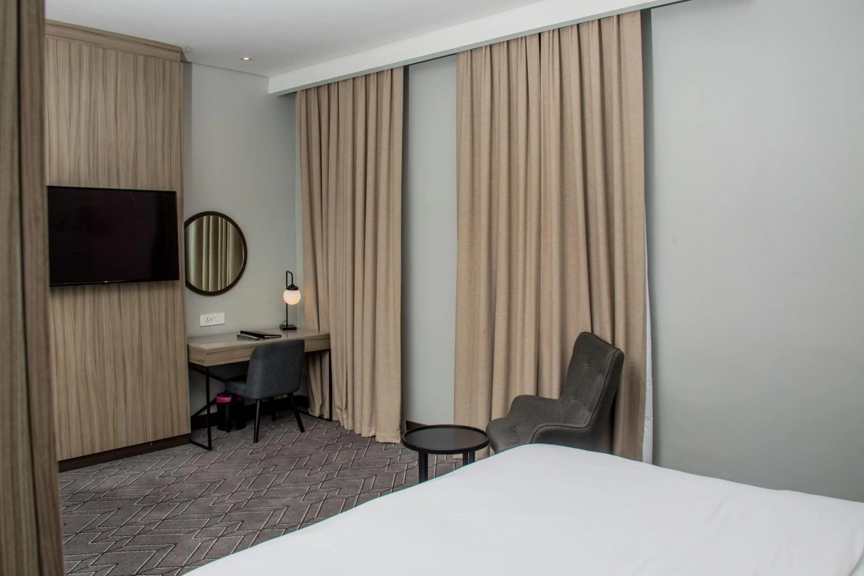 Seating area, Bed in Radisson Lagos Ikeja