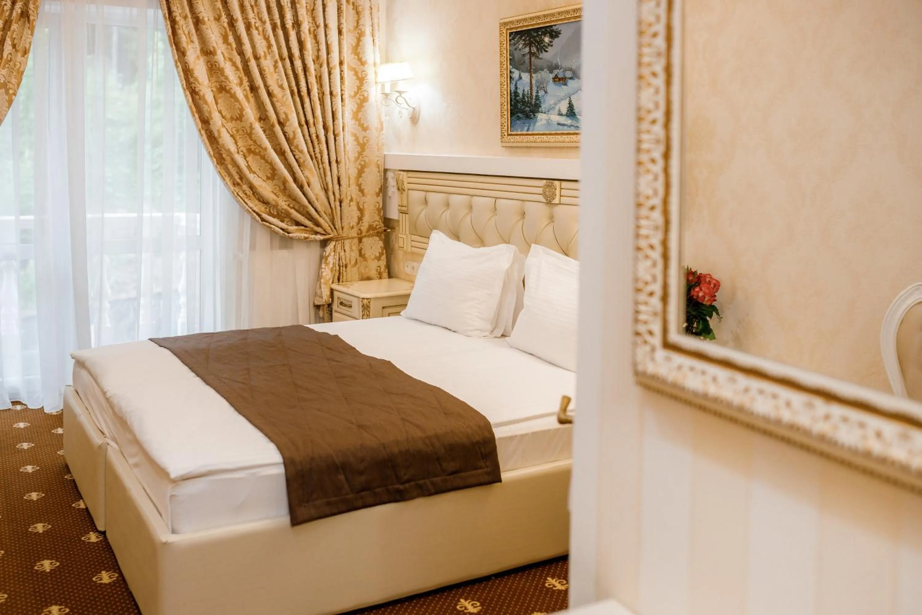 Bed in Chevalier Hotel & SPA