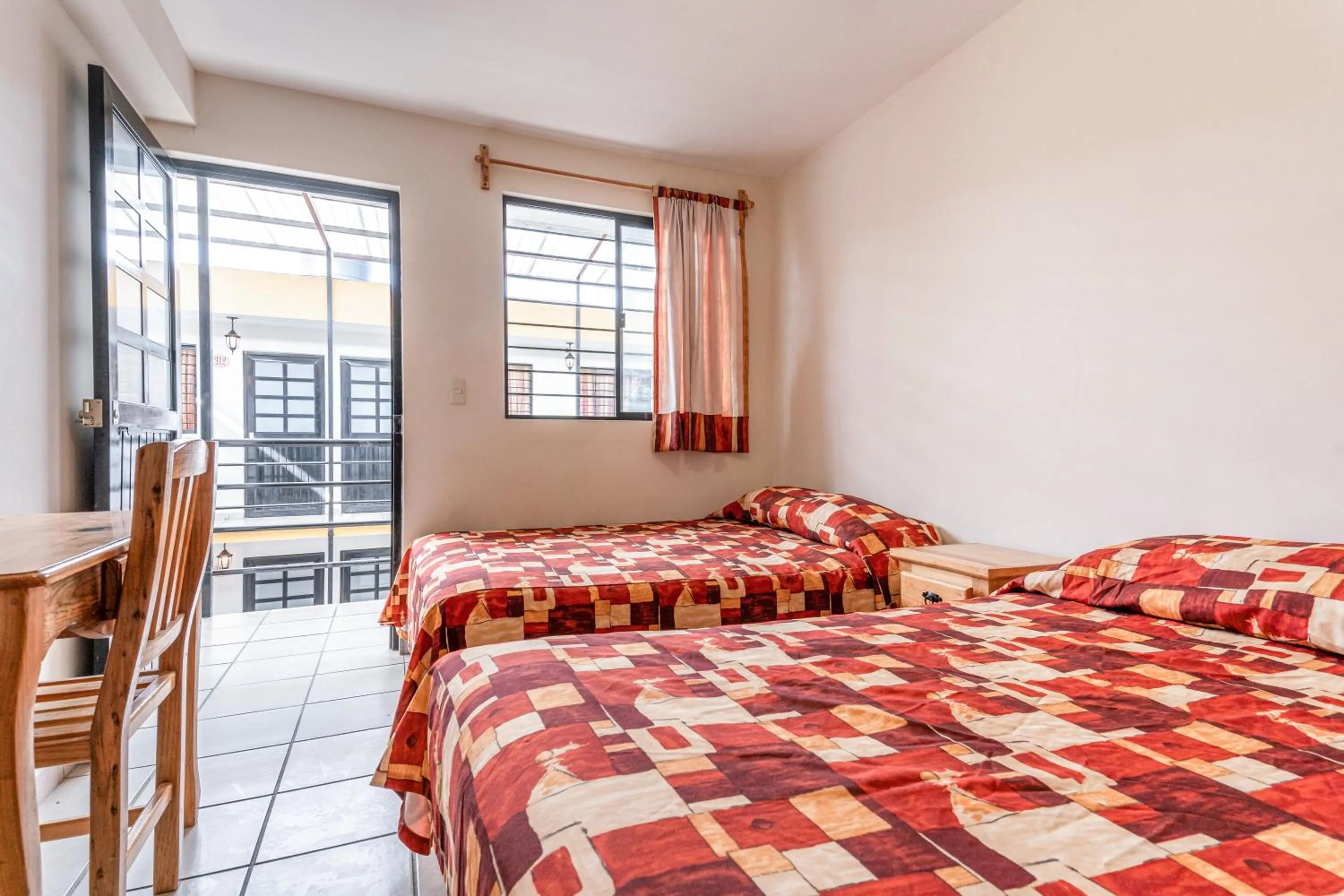 Bed in Cinco de Mayo Hotel