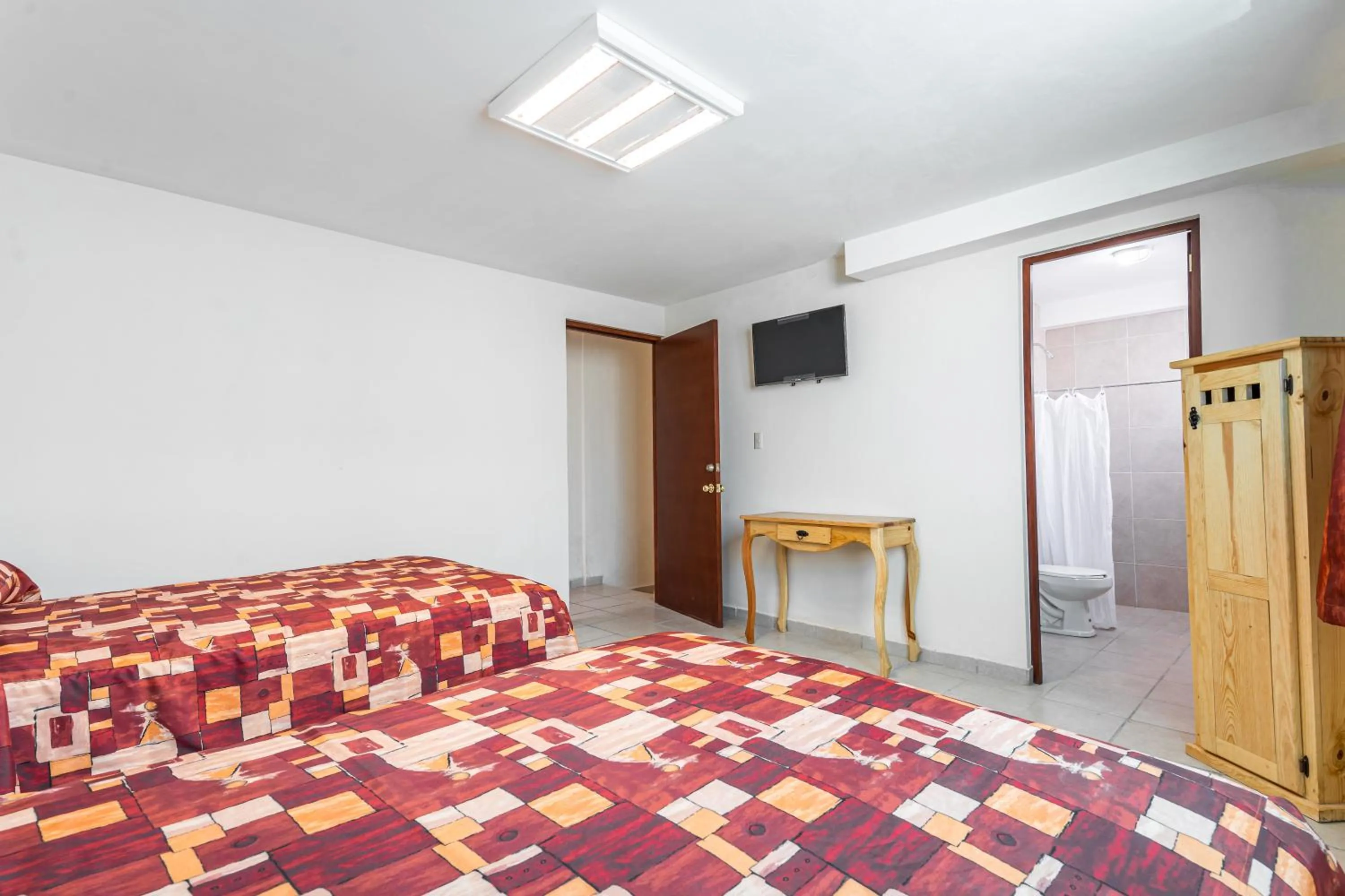 Bed in Cinco de Mayo Hotel