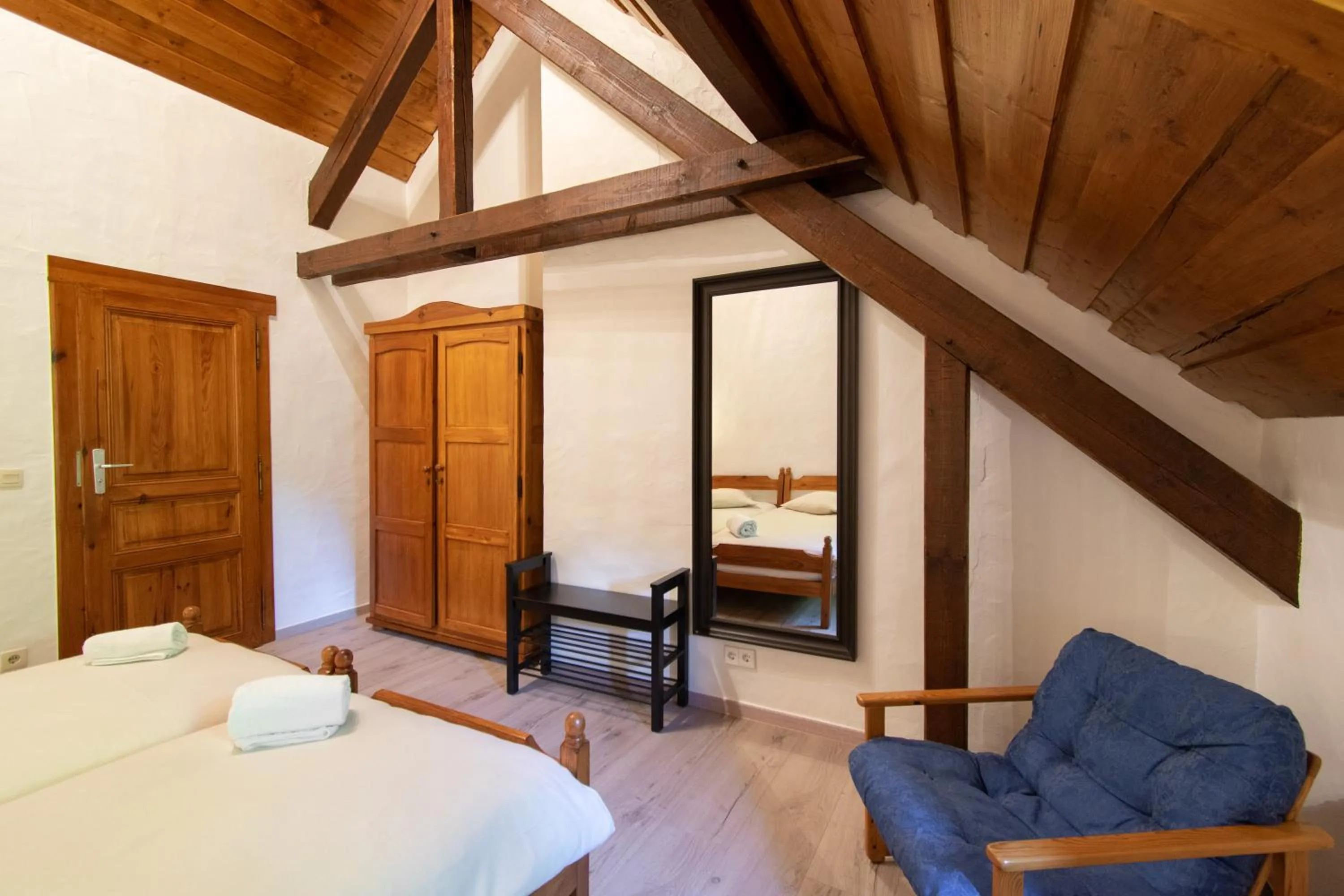 Photo of the whole room, Bed in Domaine du Moulin d'Asselborn