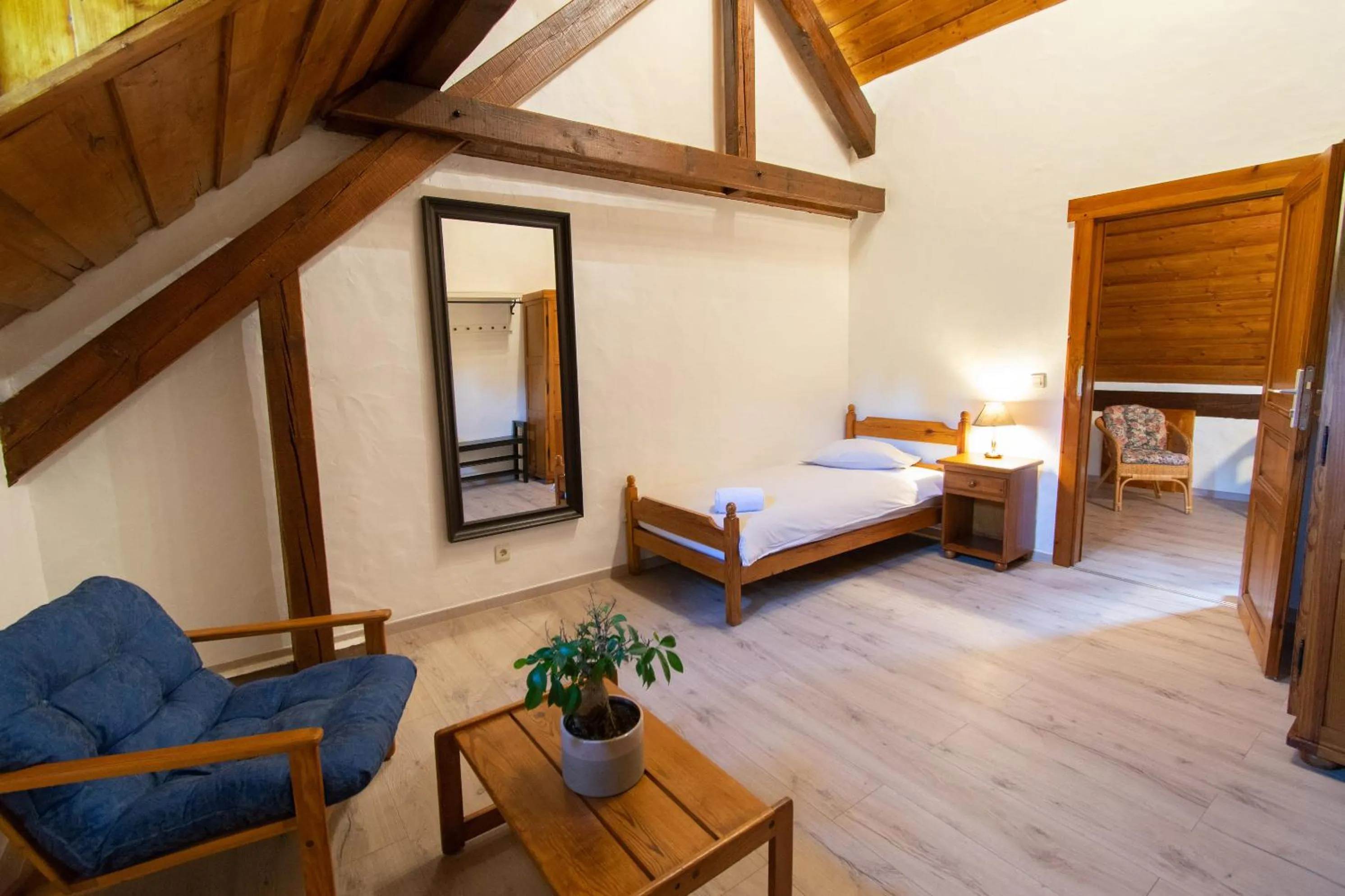 Photo of the whole room, Bed in Domaine du Moulin d'Asselborn