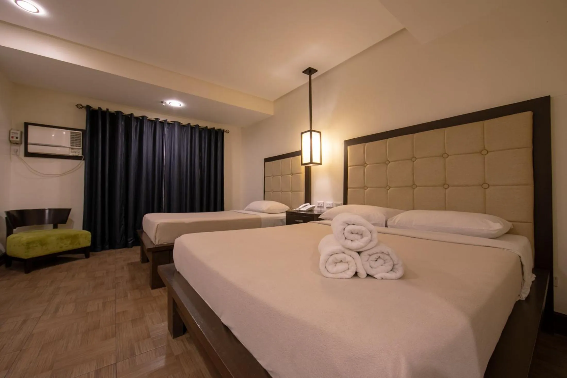 Bed in Rosvenil Hotel