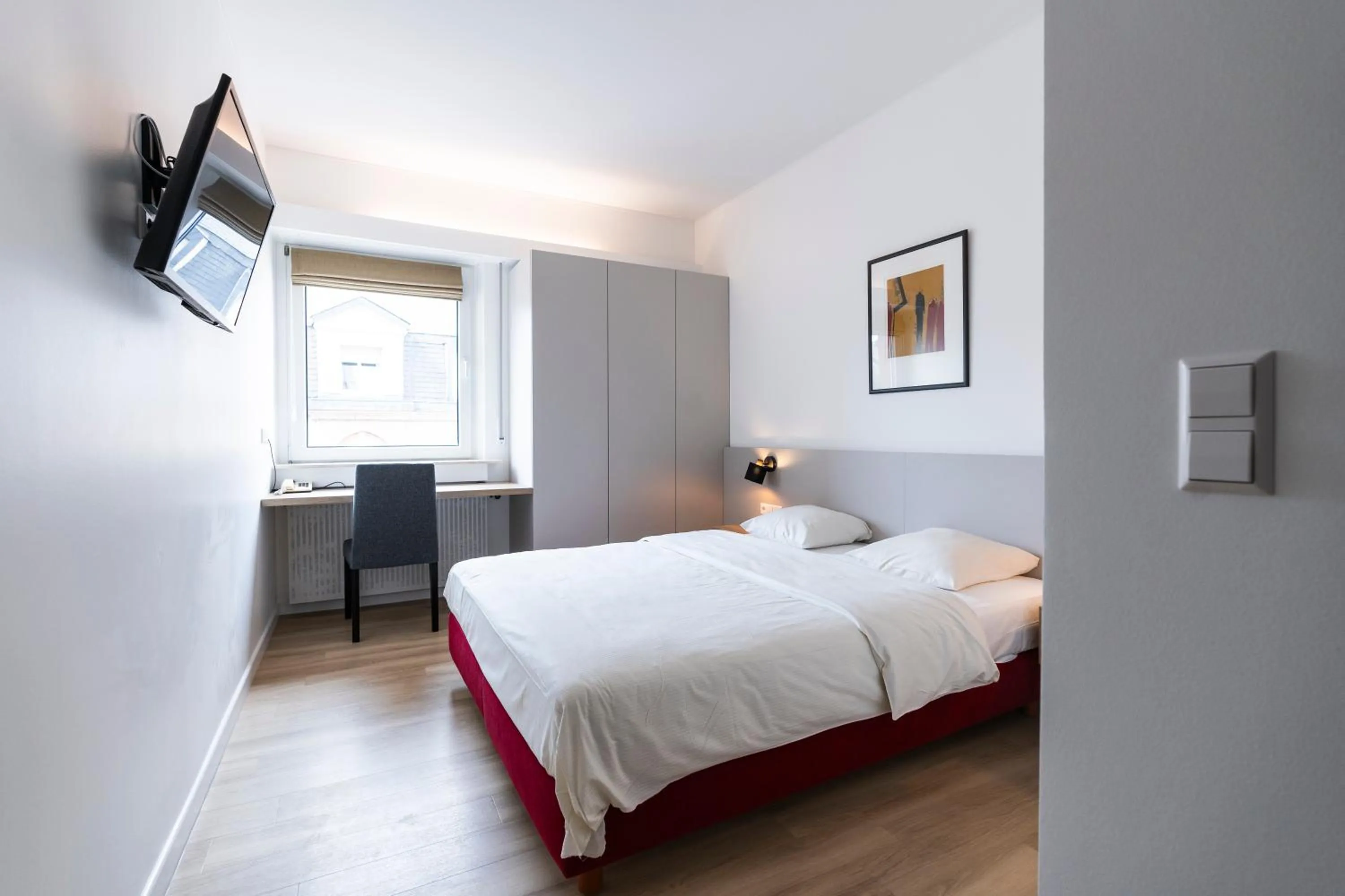 Bed in Logis Hôtel Acacia