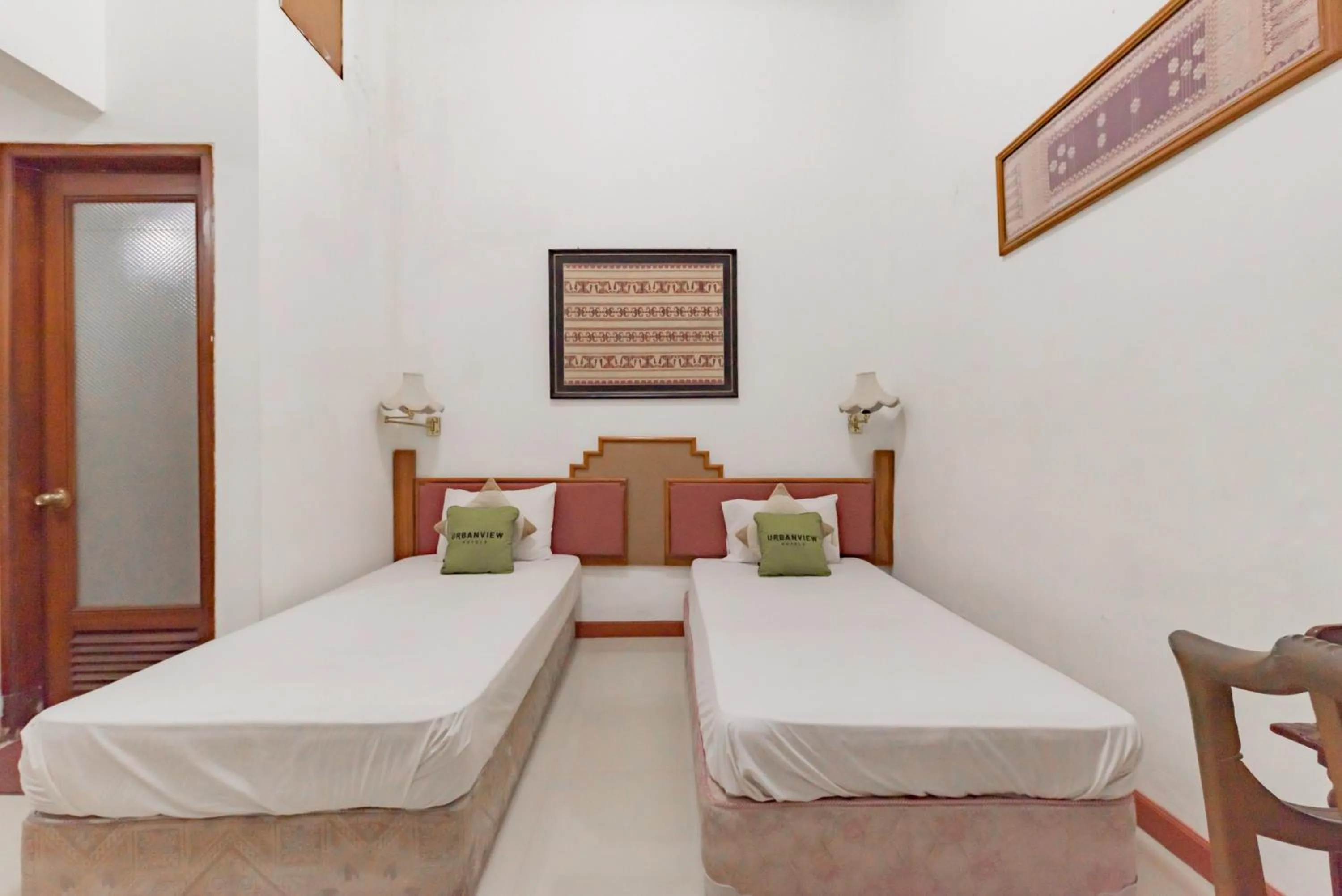 Bedroom, Bed in Urbanview De Ethnic Hotel Bandung by RedDoorz