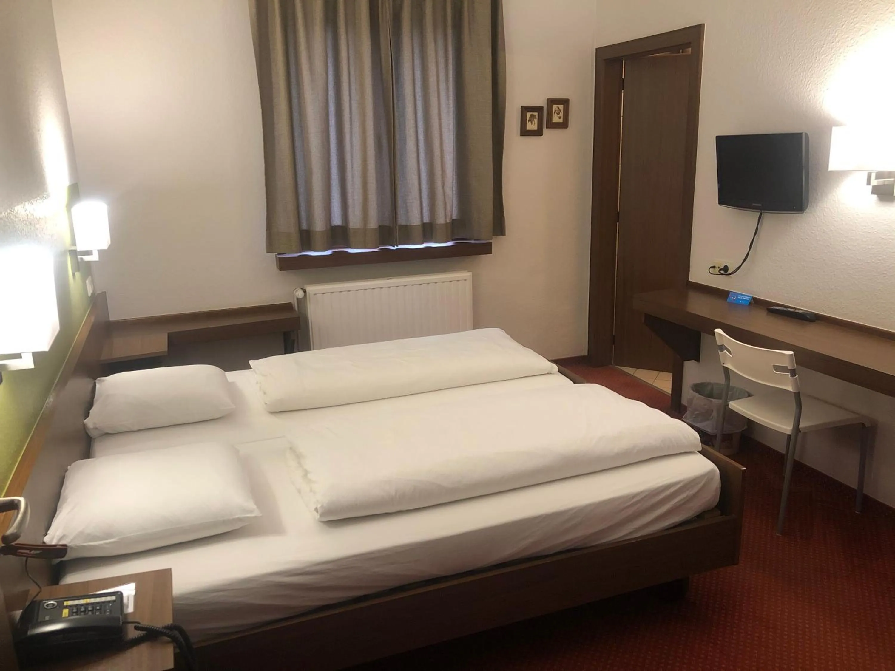 Bed in Hotel du Parc