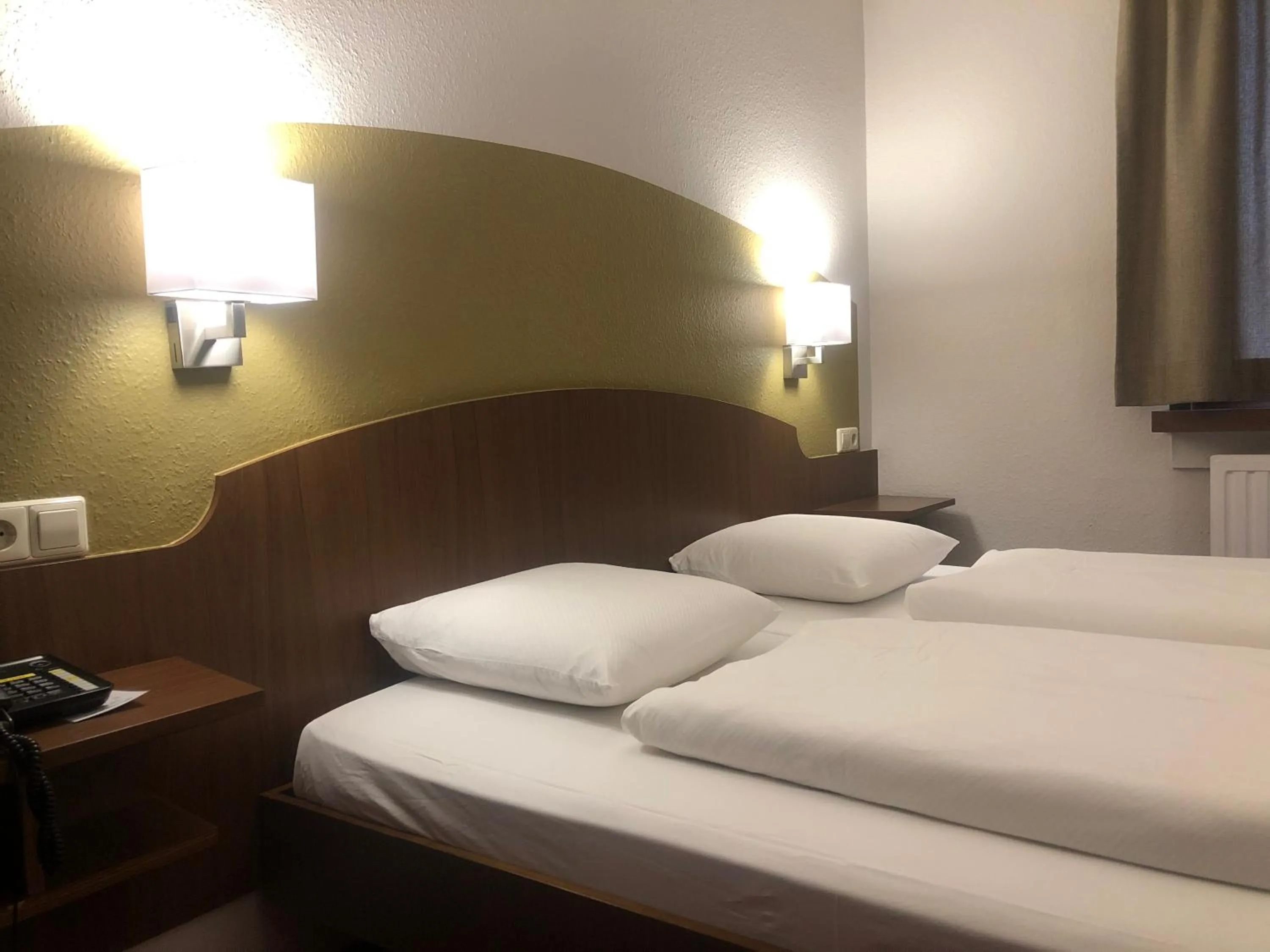 Bed in Hotel du Parc