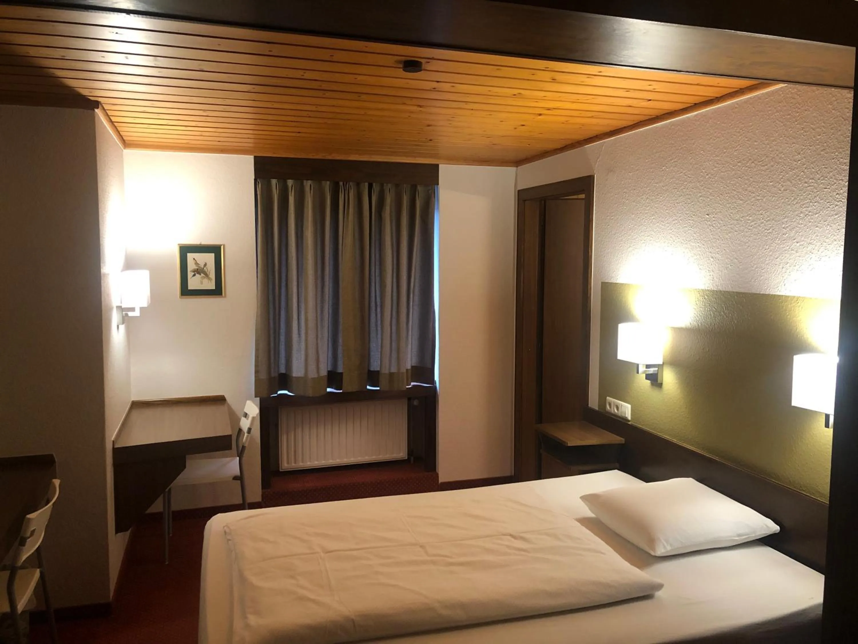 Bed in Hotel du Parc