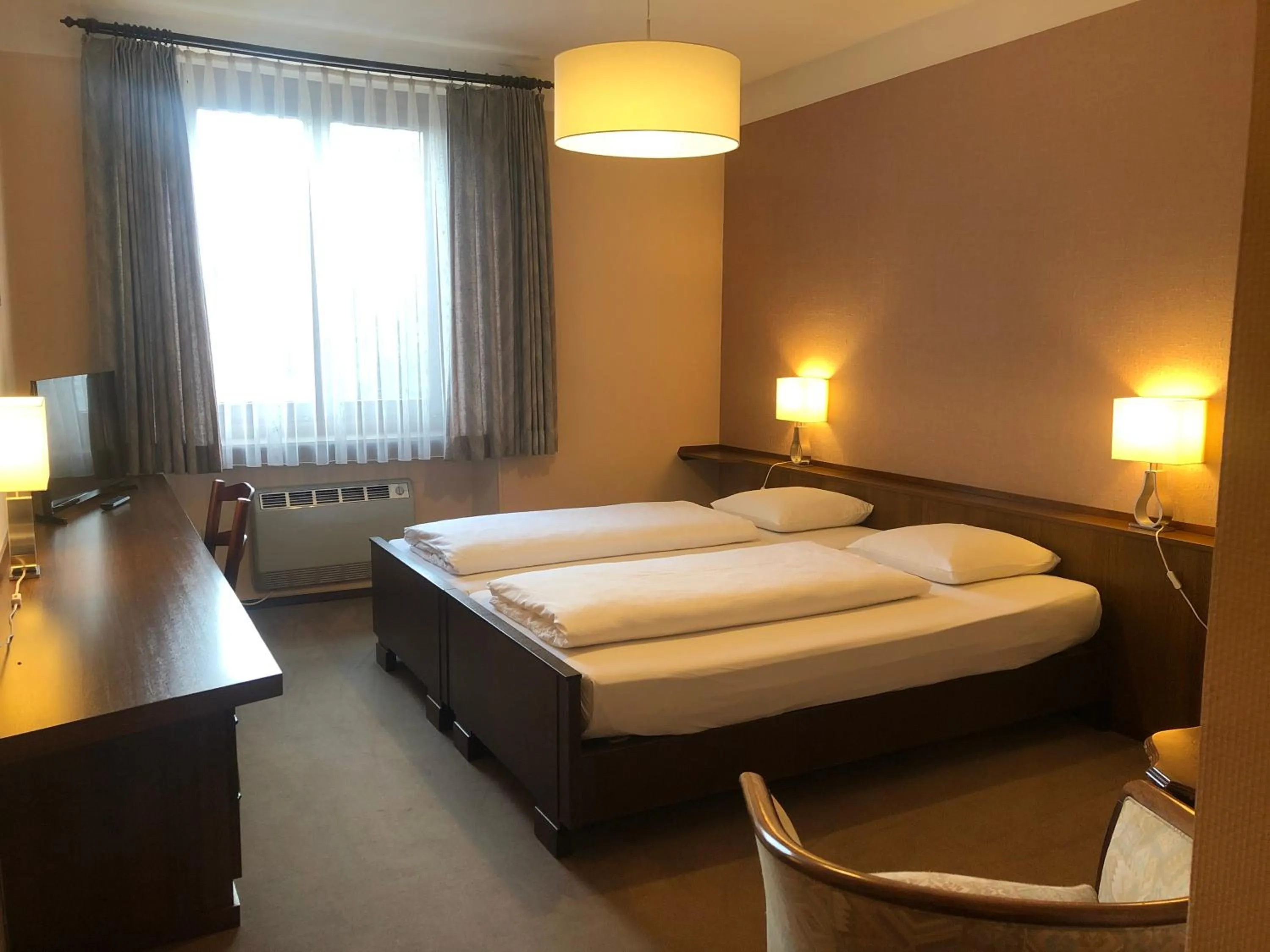 Bed in Hotel du Parc