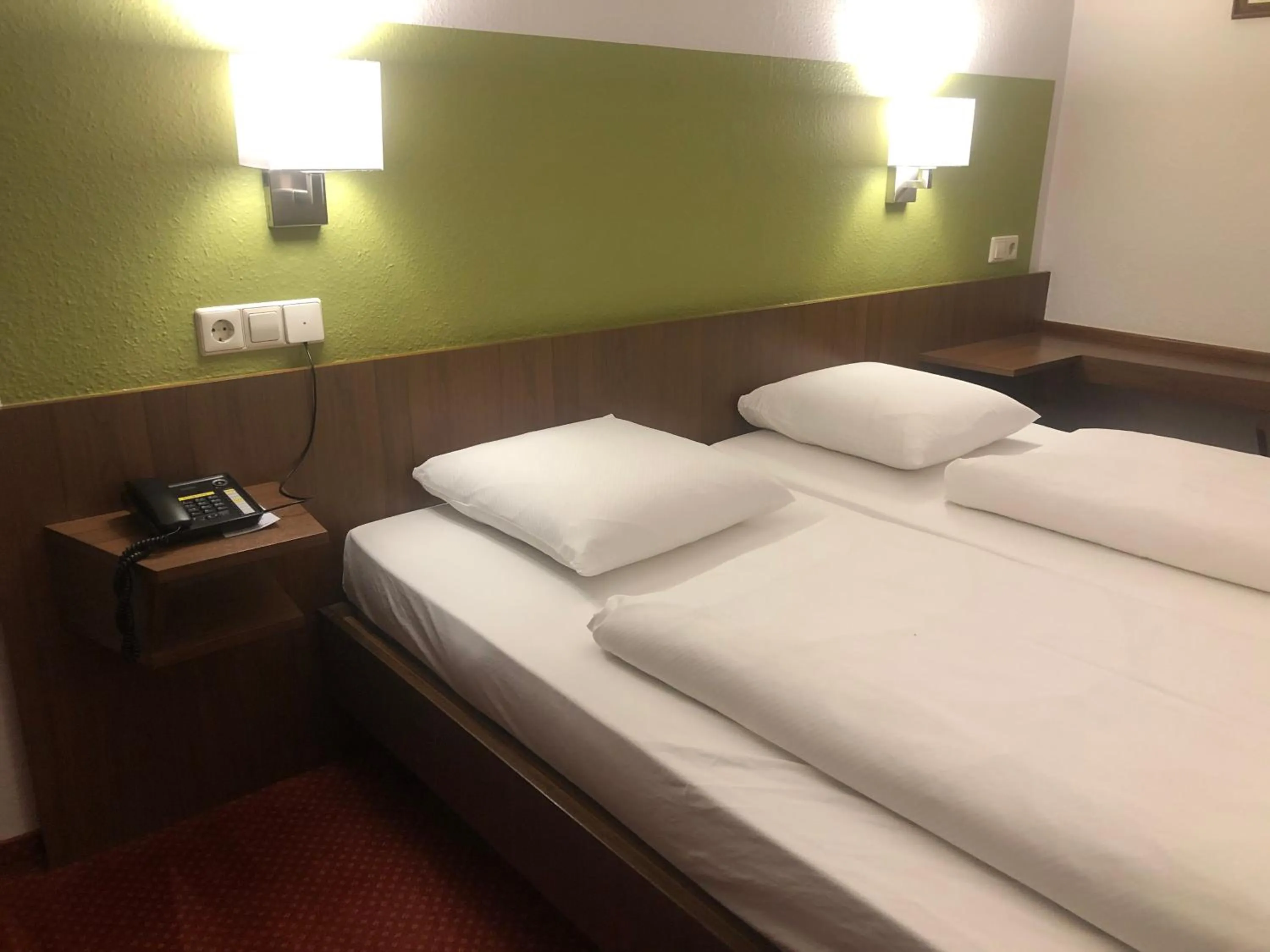 Bed in Hotel du Parc