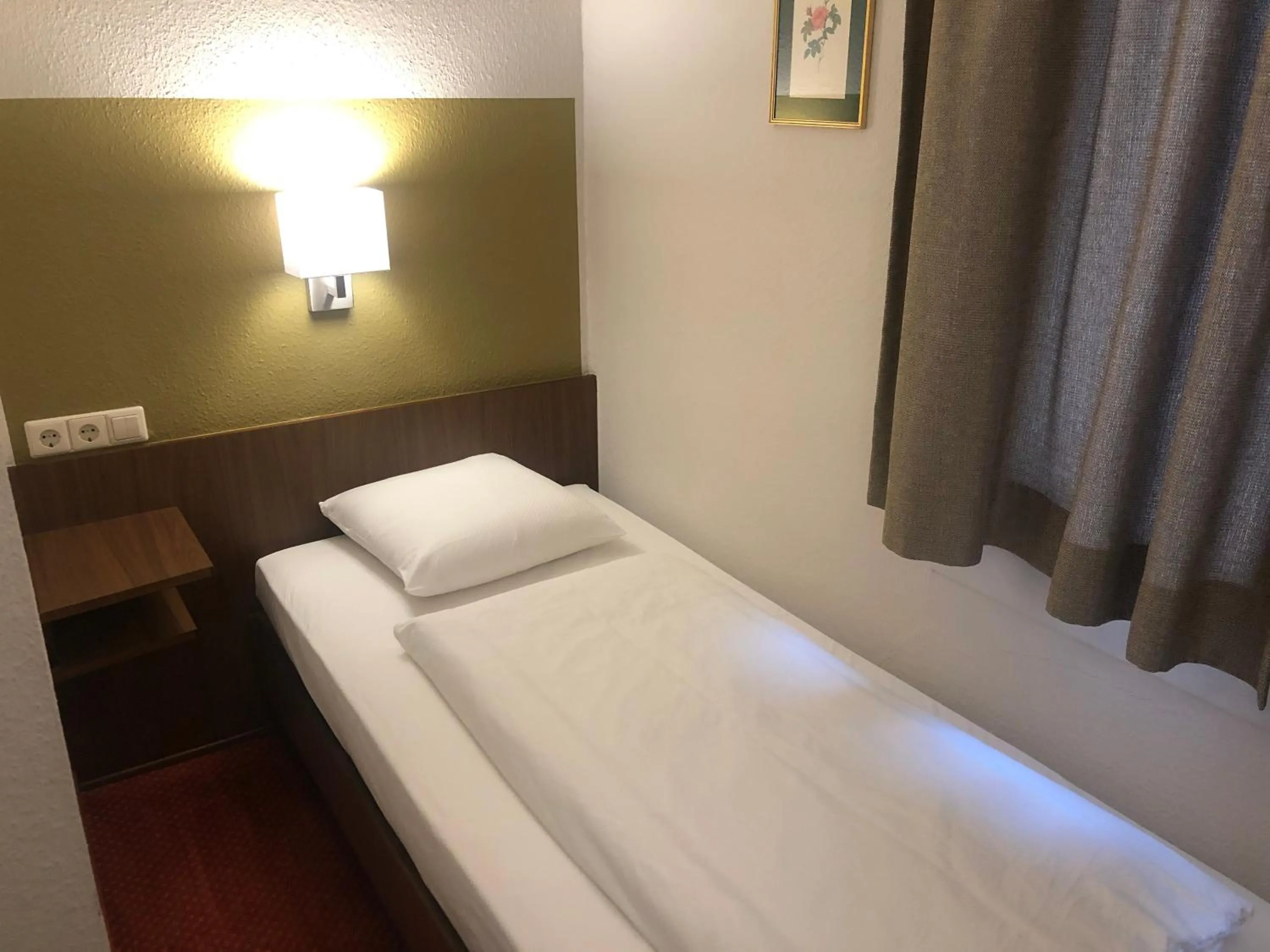 Bed in Hotel du Parc