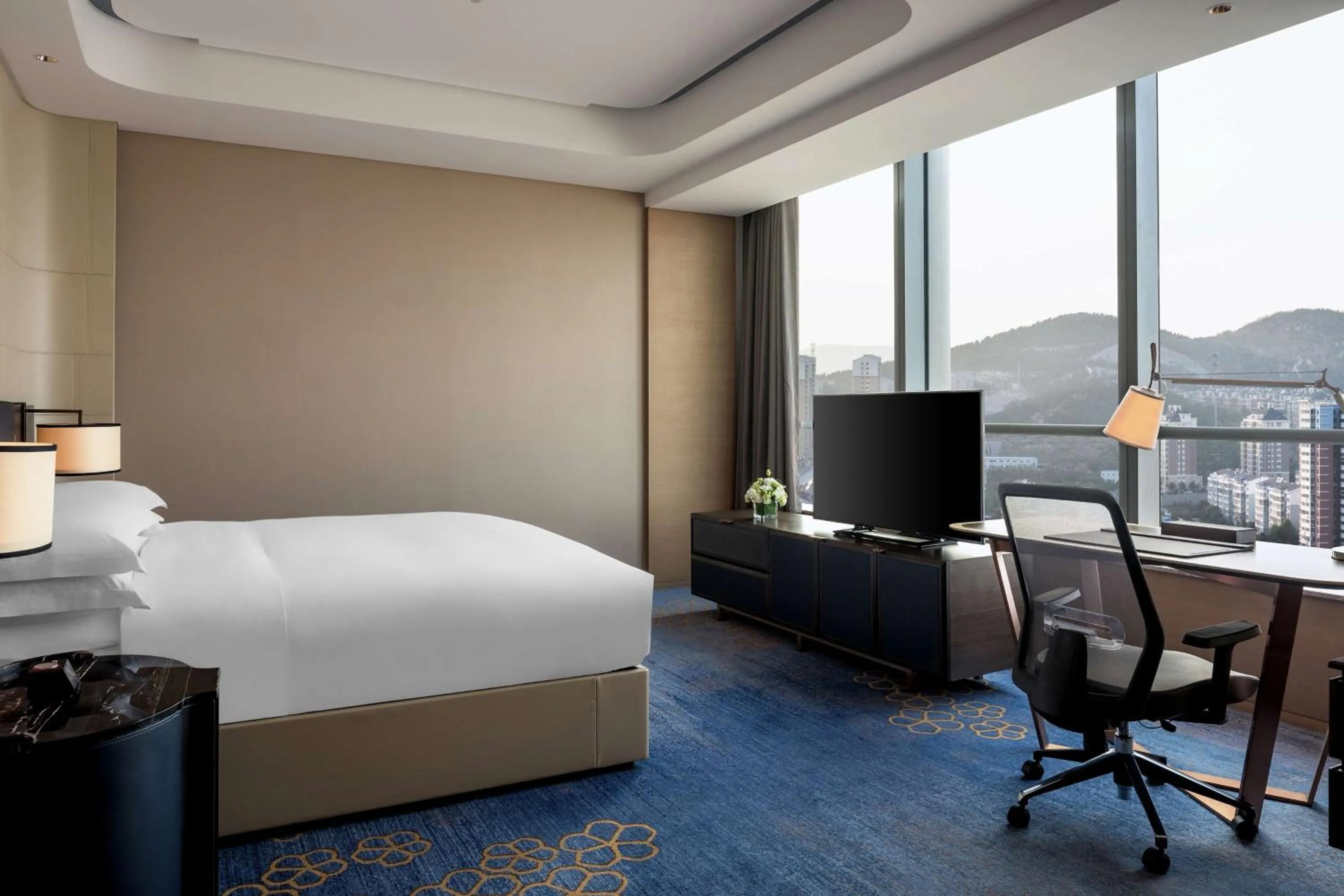 Bed in Hilton Jinan South Hotel & Residences