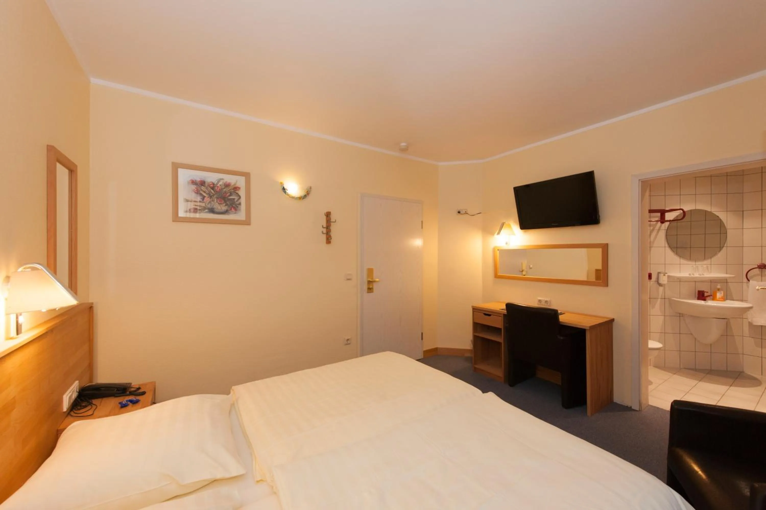 Bed in Hotel Belle Vue