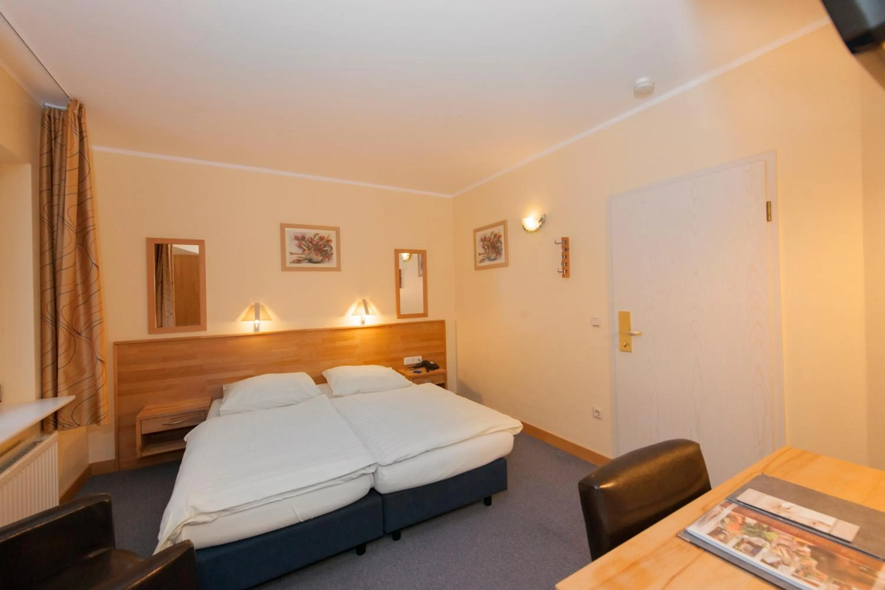 Bed in Hotel Belle Vue