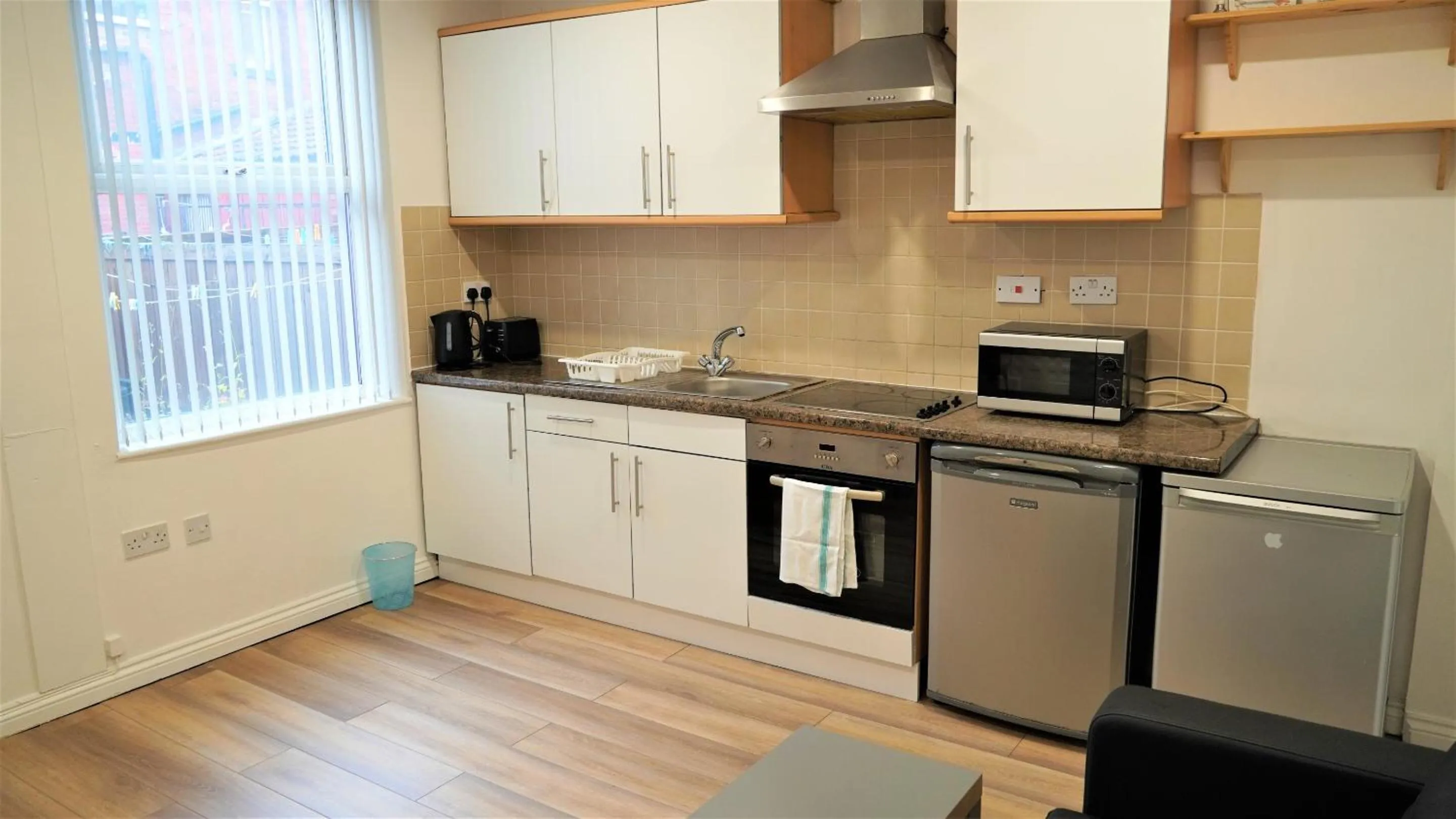 Kitchen or kitchenette in Ruth Apartments