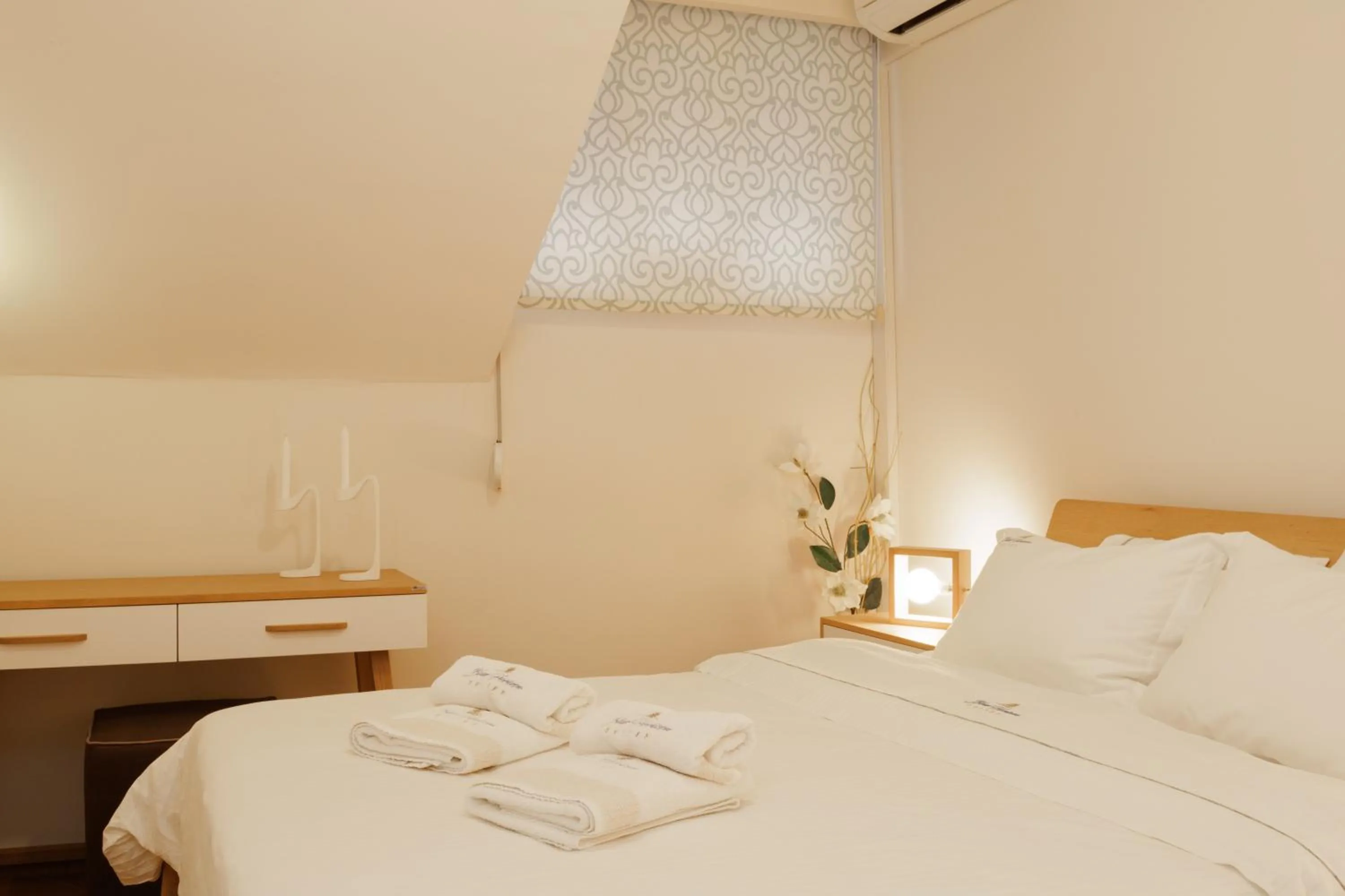 Bed in Blue Horizon Suites