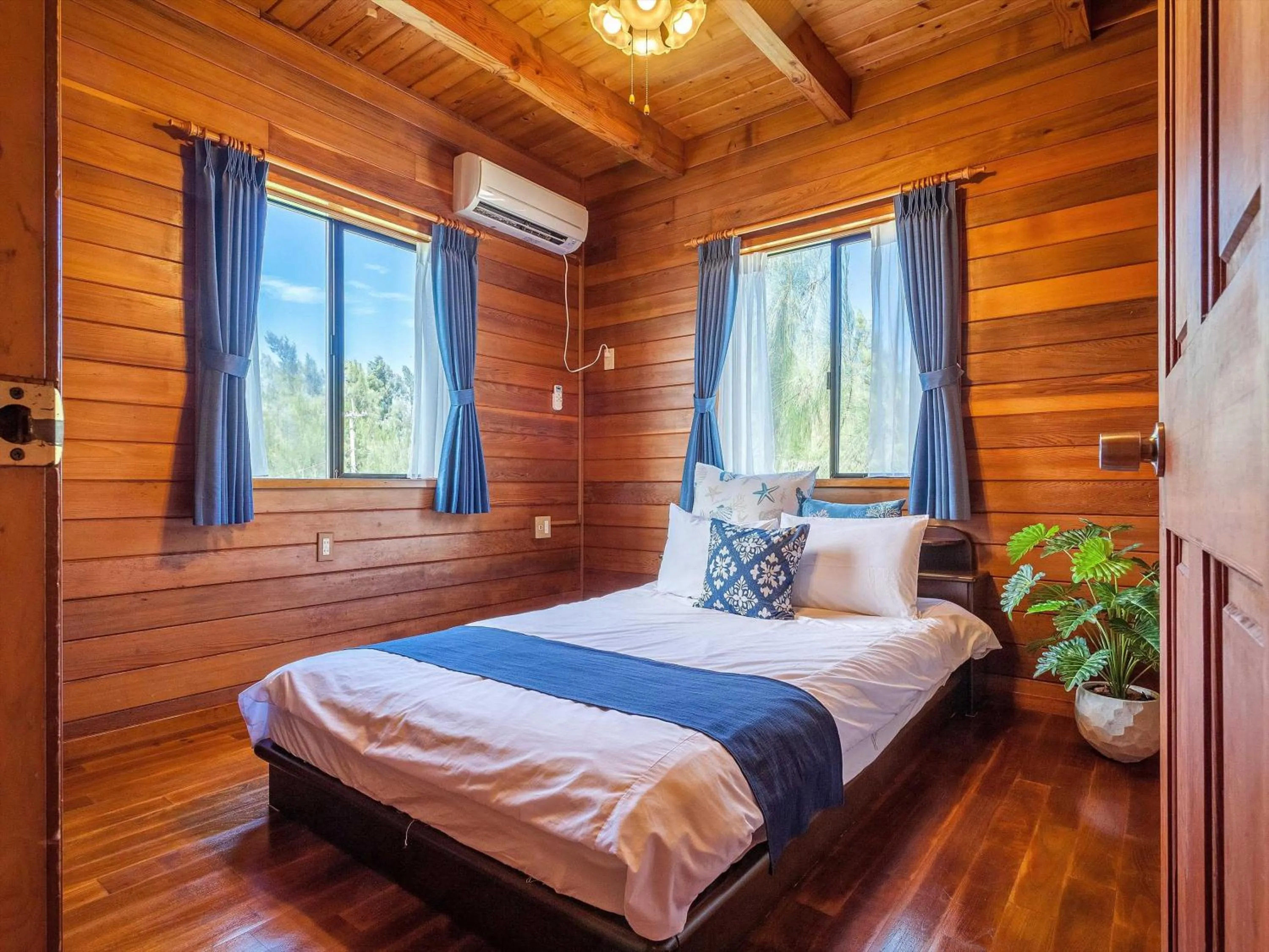 Photo of the whole room, Bed in Kariyushi Condominium Resort Yuudekiya