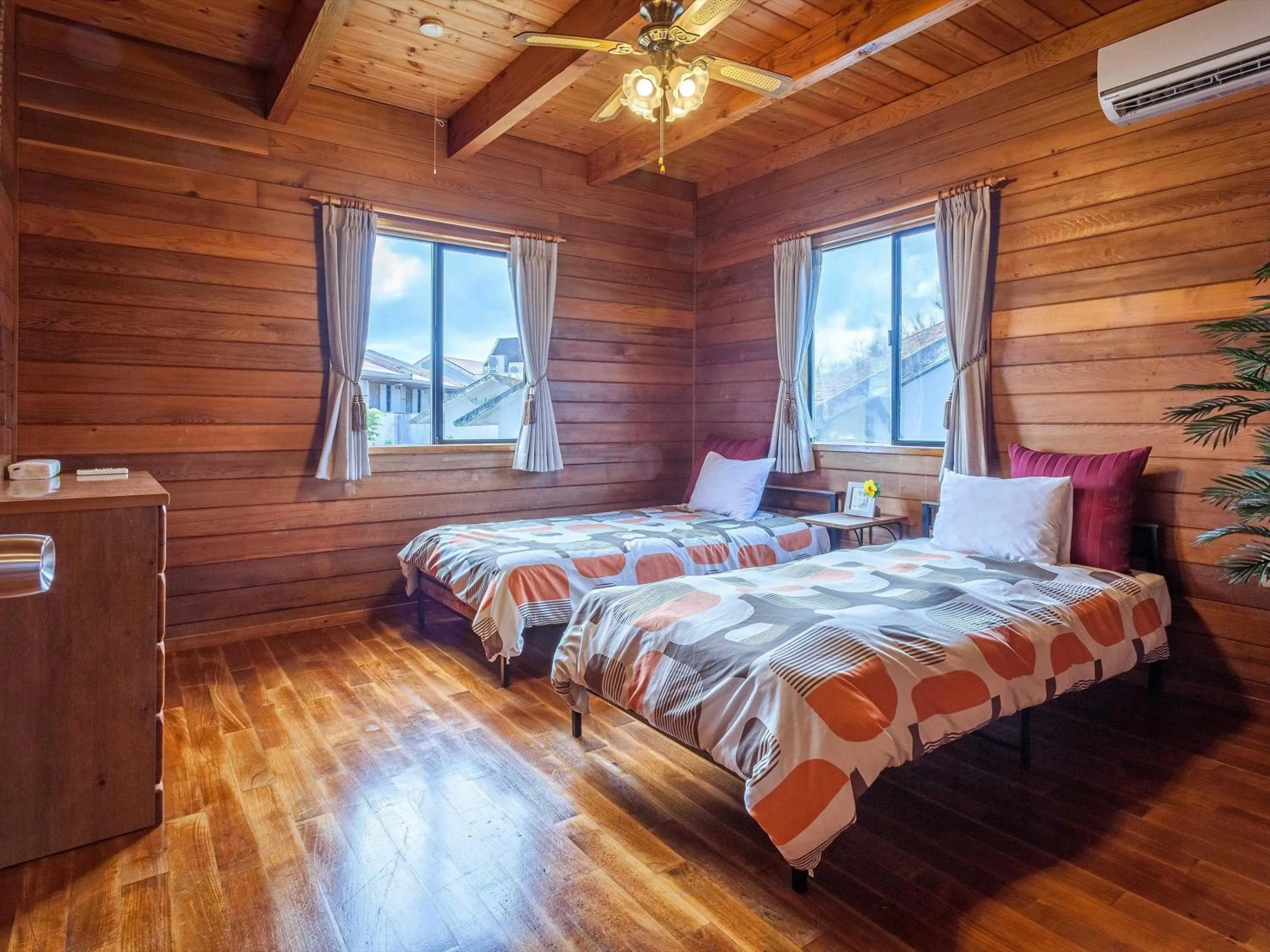 Photo of the whole room, Bed in Kariyushi Condominium Resort Yuudekiya