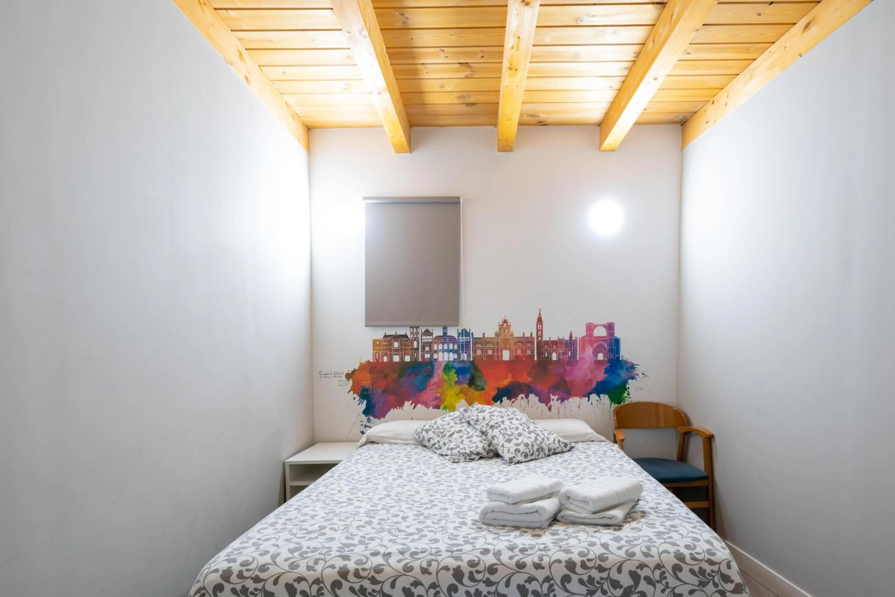 Bed in Apartamentos GO - Leopoldo Cano Center