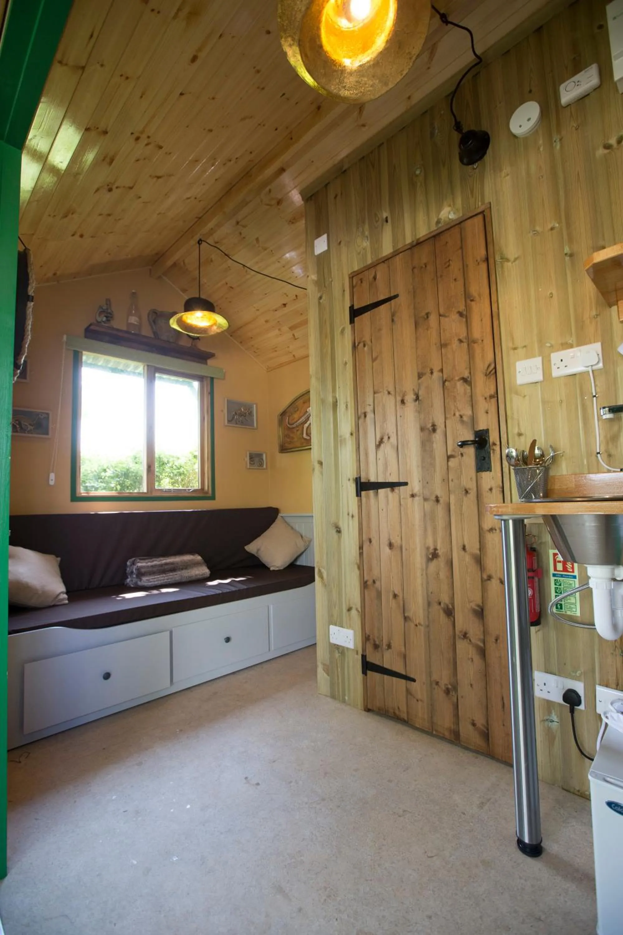 Seating area, Bed in Adventurer's Village Milton Keynes