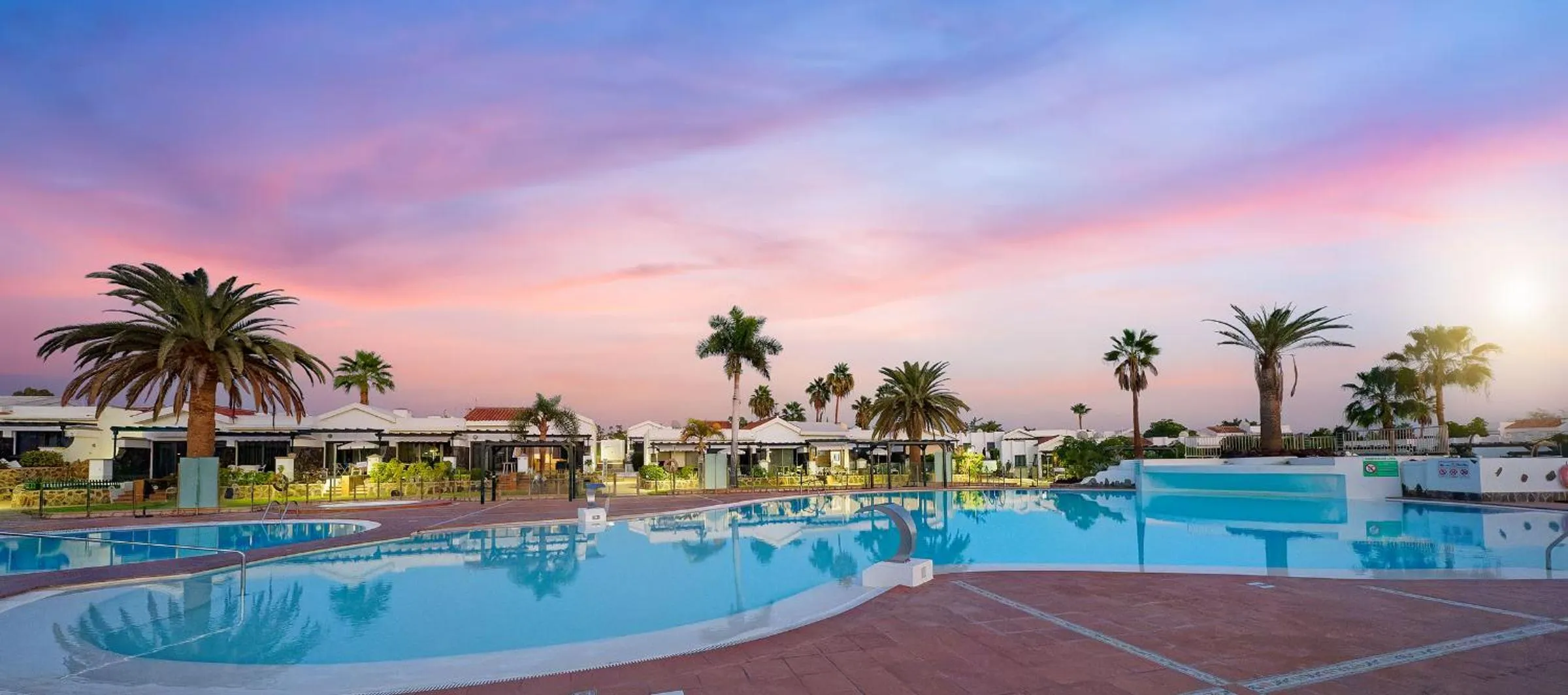 Swimming pool in Maspalomas Lago Canary Sunset